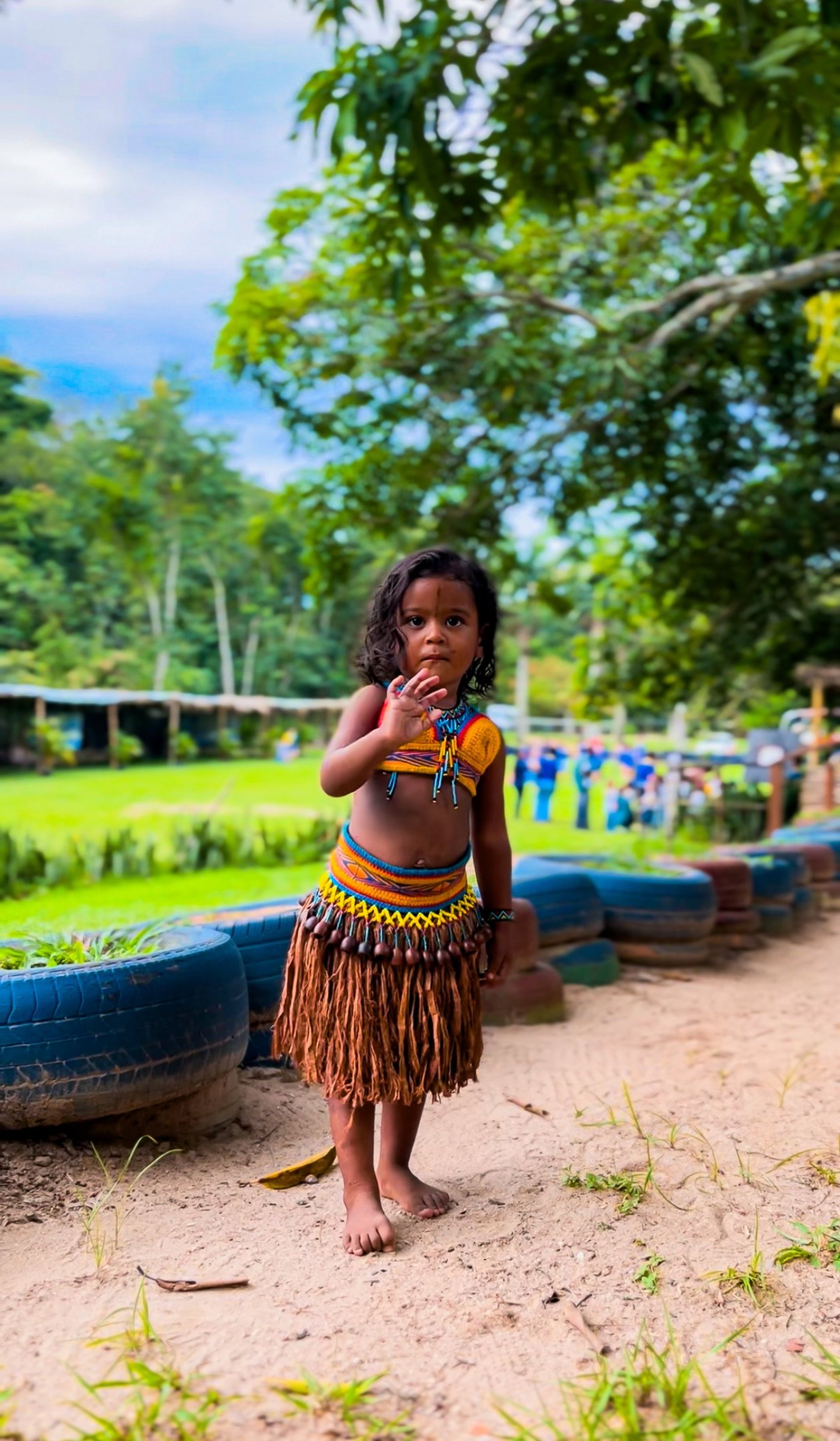 an abstract photo of a curved building with a blue sky in the background