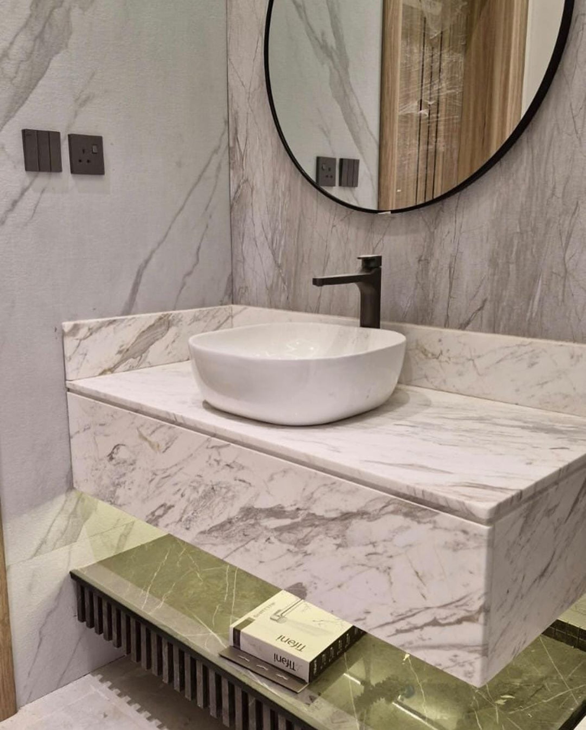 black and brown leather padded tub sofa