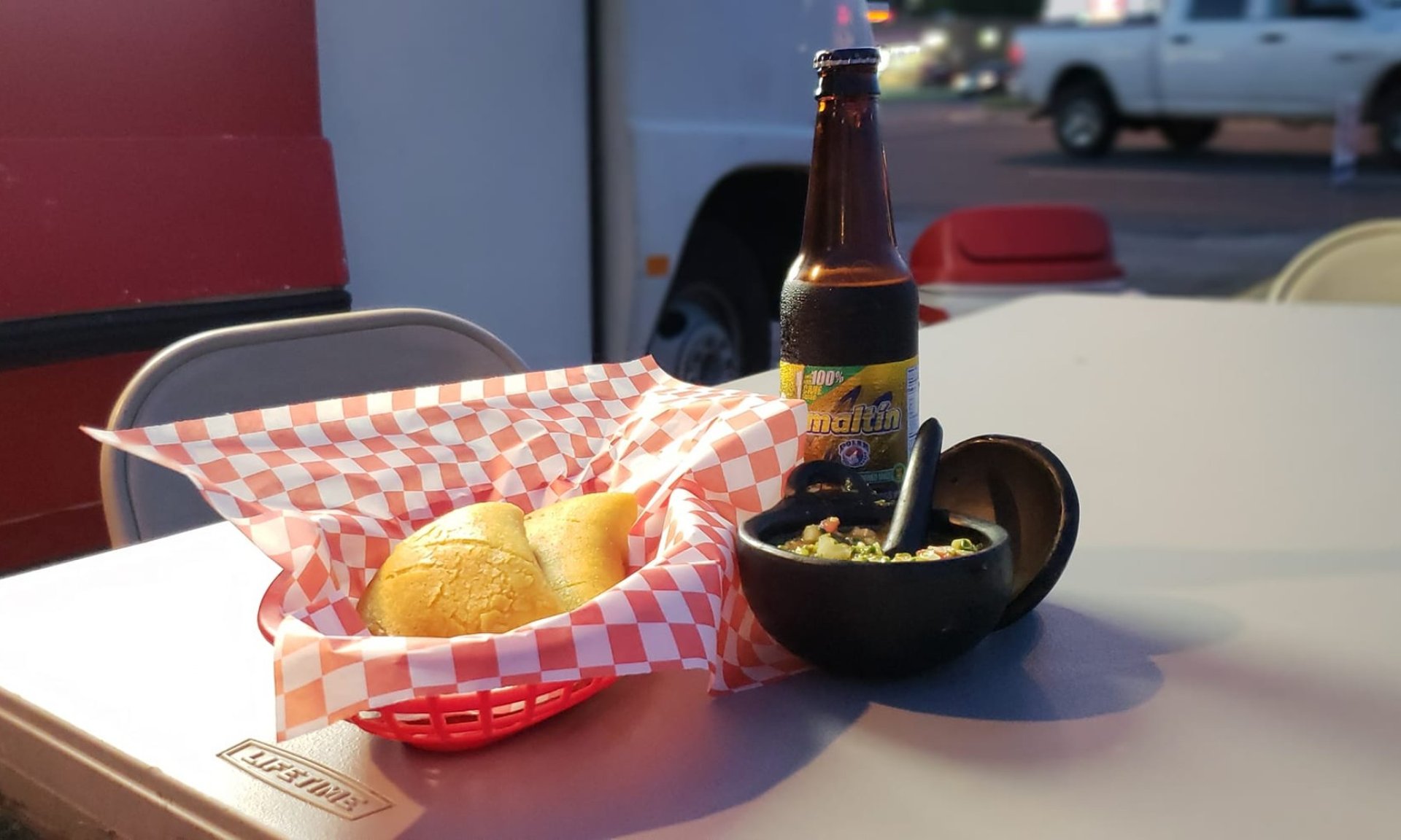 woman wearing yellow long-sleeved dress under white clouds and blue sky during daytime