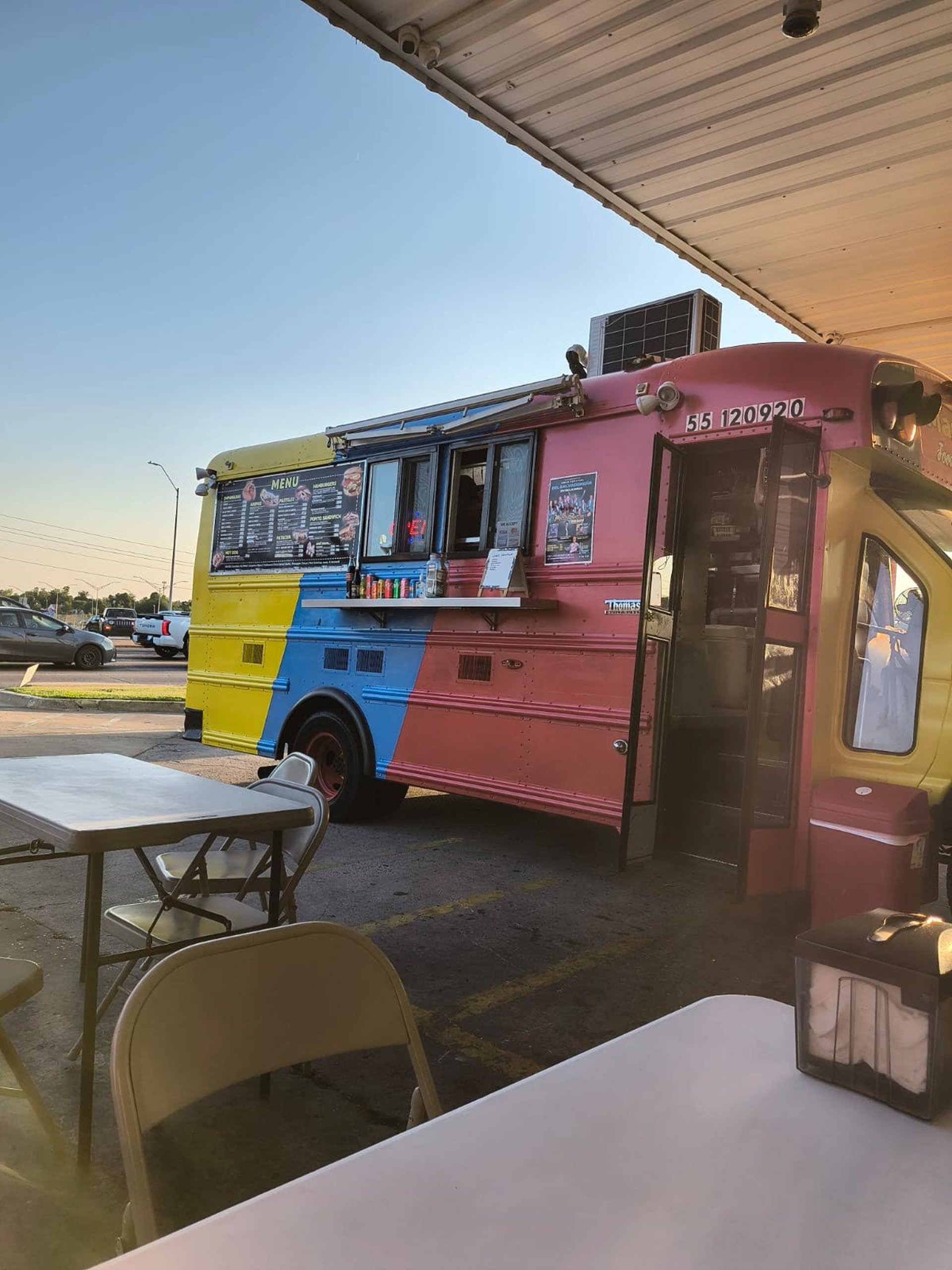 woman wearing yellow long-sleeved dress under white clouds and blue sky during daytime