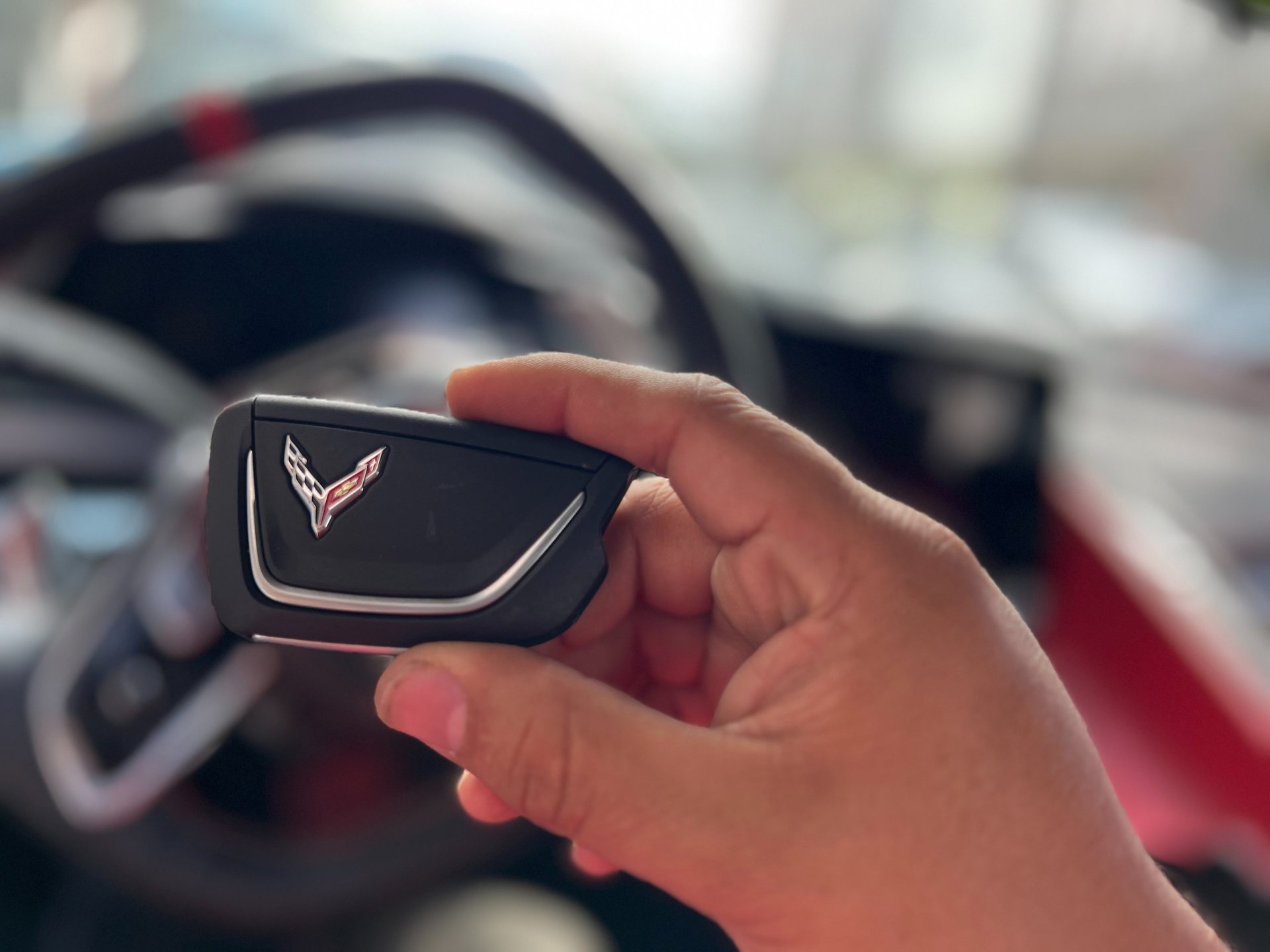 an abstract photo of a curved building with a blue sky in the background