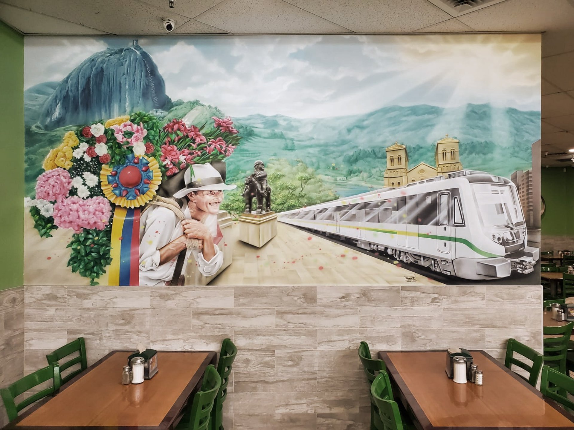 an abstract photo of a curved building with a blue sky in the background