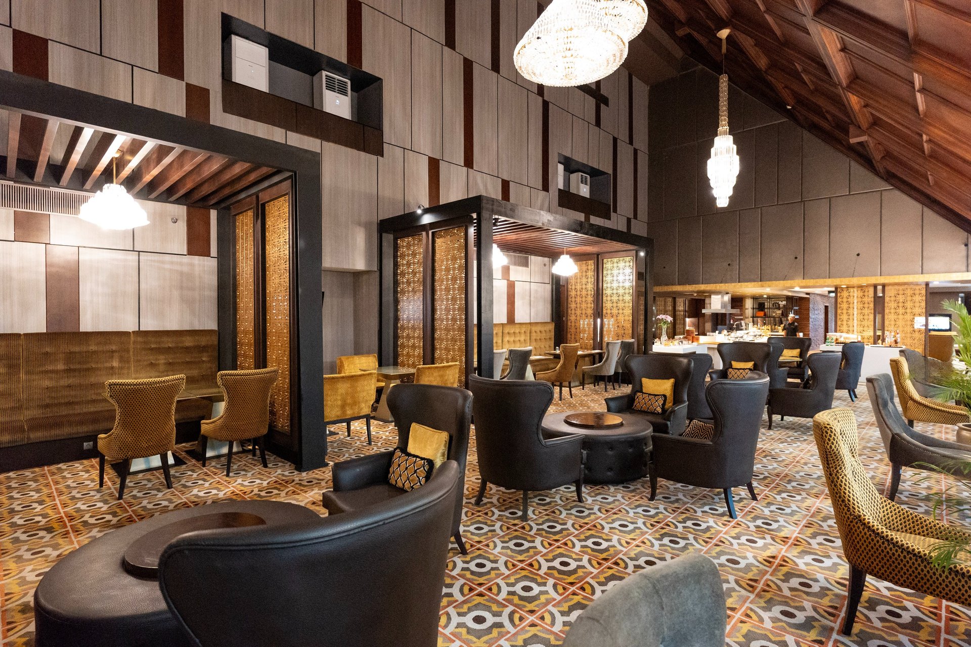 an abstract photo of a curved building with a blue sky in the background