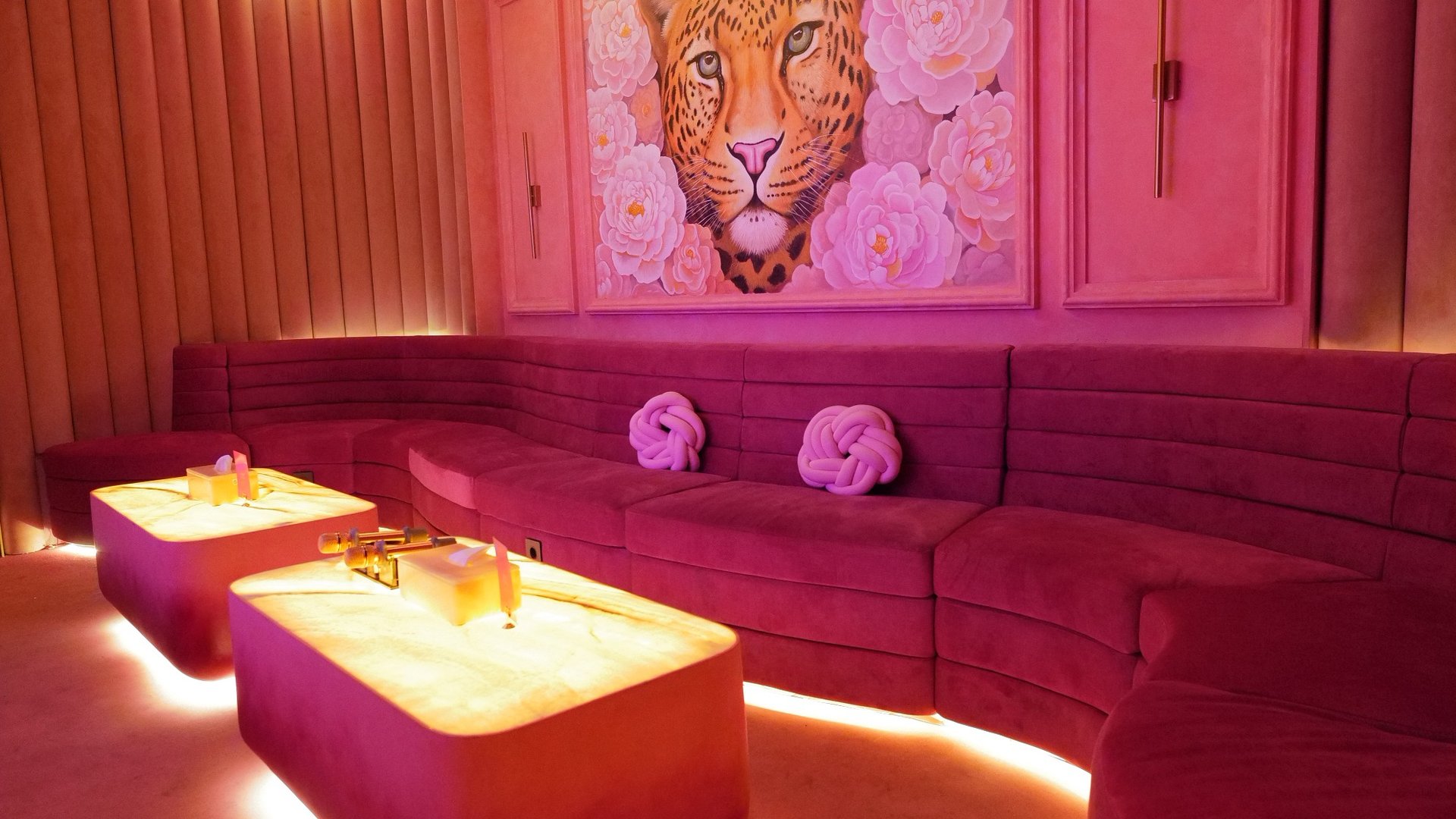 an abstract photo of a curved building with a blue sky in the background