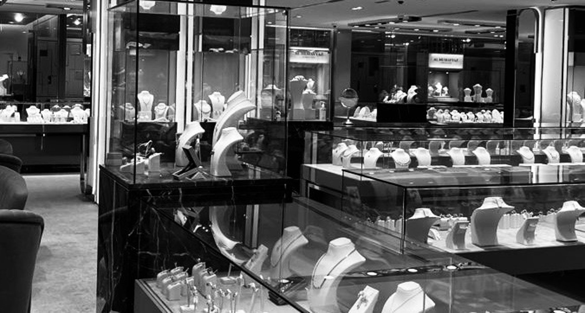 an abstract photo of a curved building with a blue sky in the background