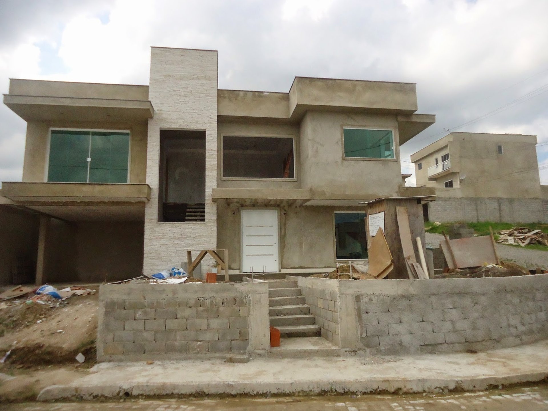 a close up of a black and brown abstract painting