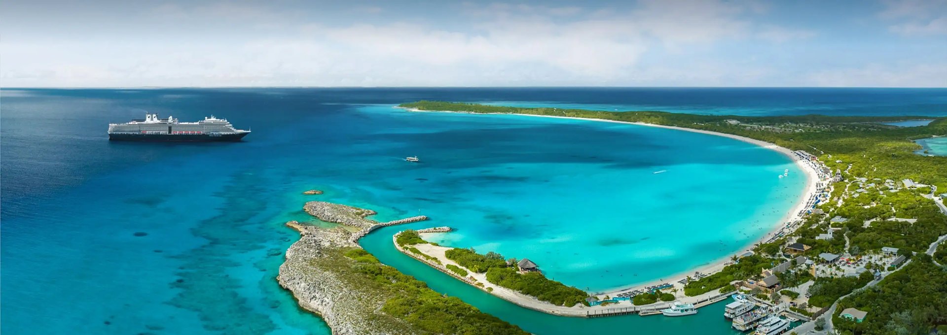 an abstract photo of a curved building with a blue sky in the background