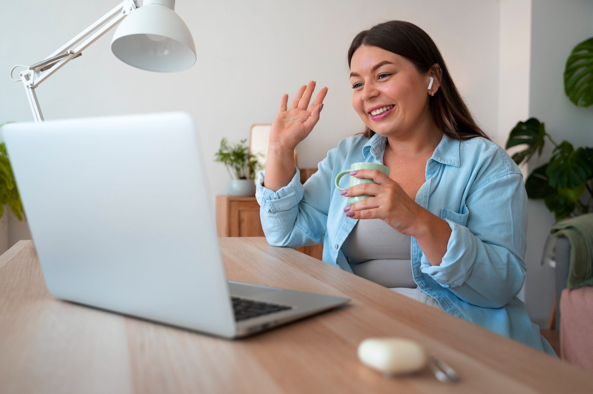 an abstract photo of a curved building with a blue sky in the background