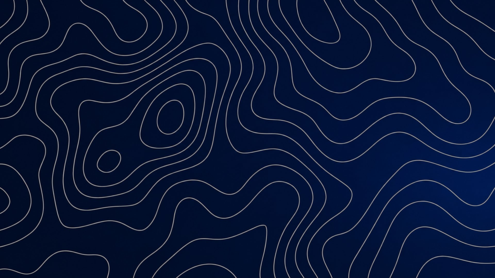 Abstract blue lines against a dark background.