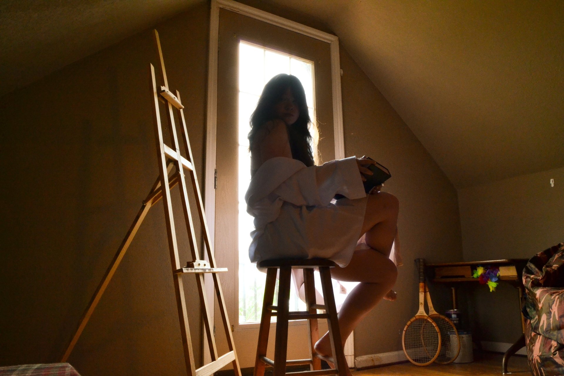woman wearing yellow long-sleeved dress under white clouds and blue sky during daytime