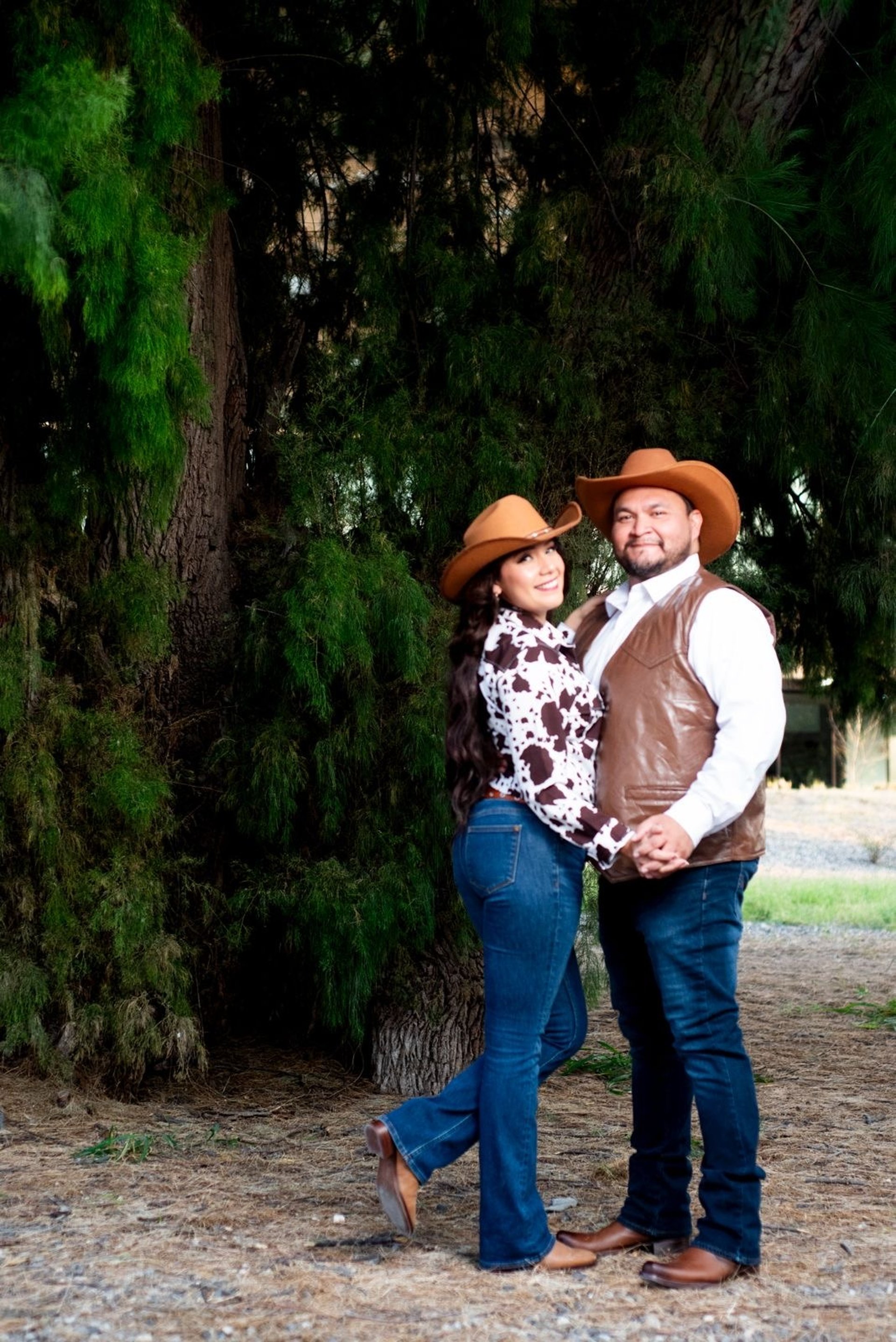 couple wearing silver-colored rings