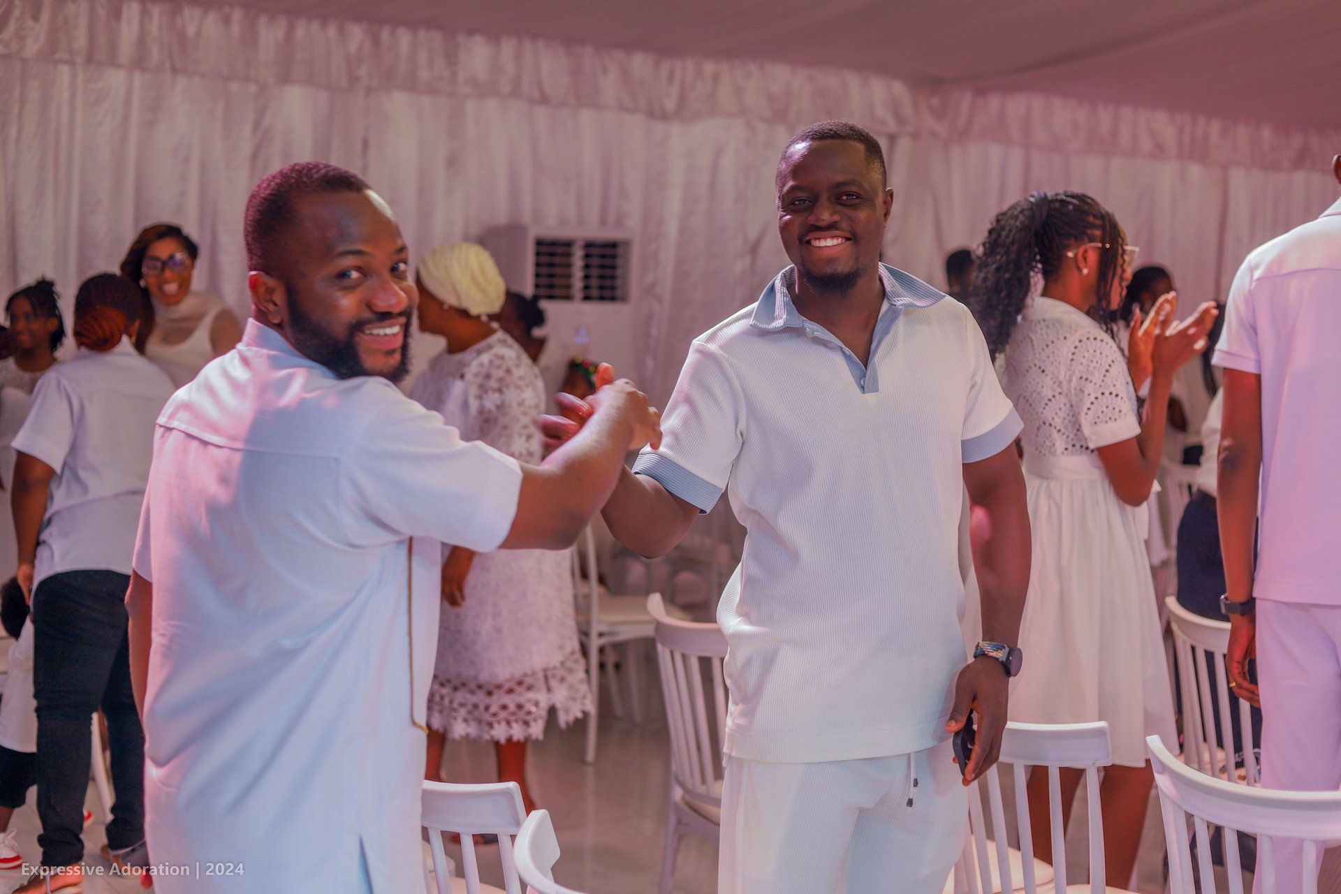 an abstract photo of a curved building with a blue sky in the background