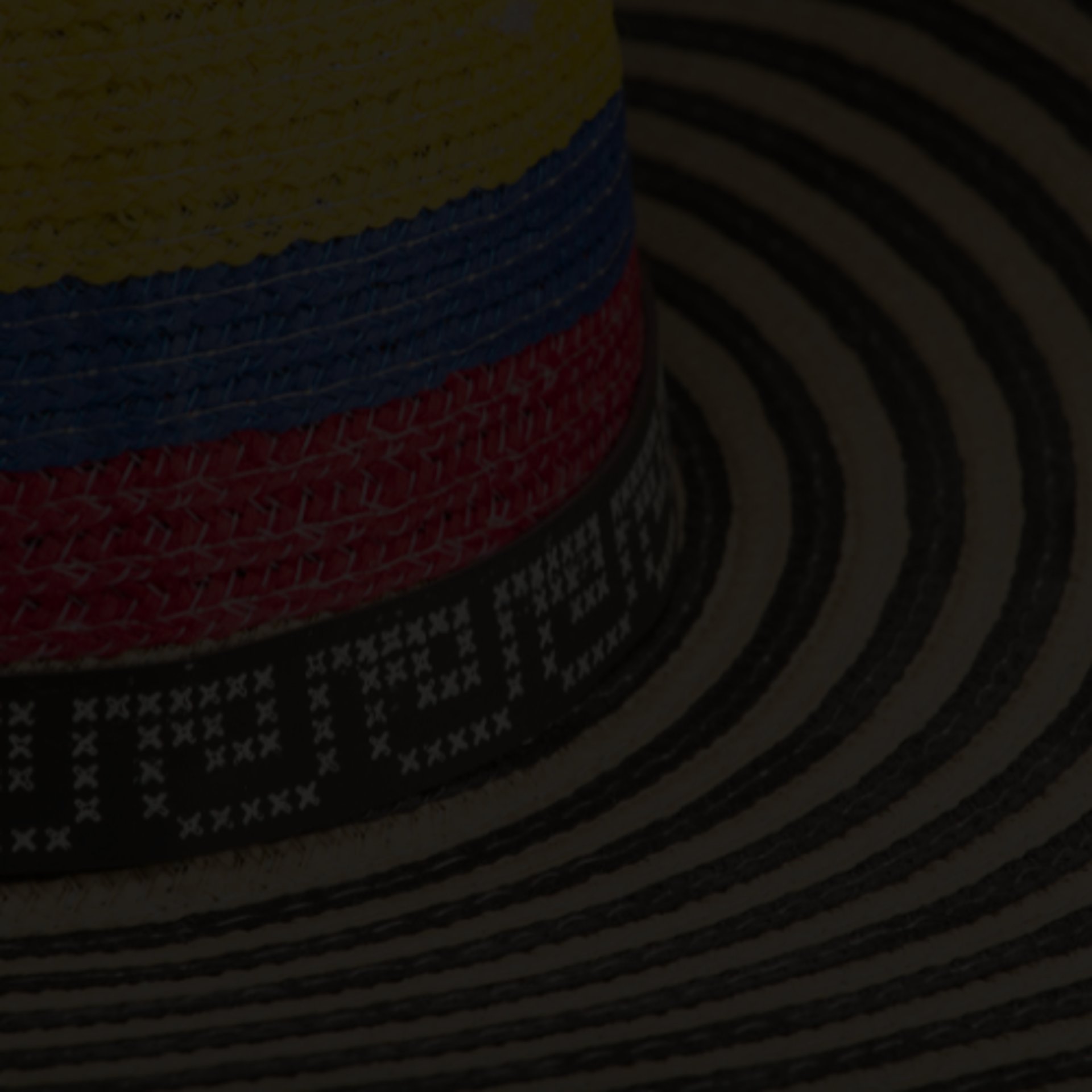 a close up of a black and brown abstract painting