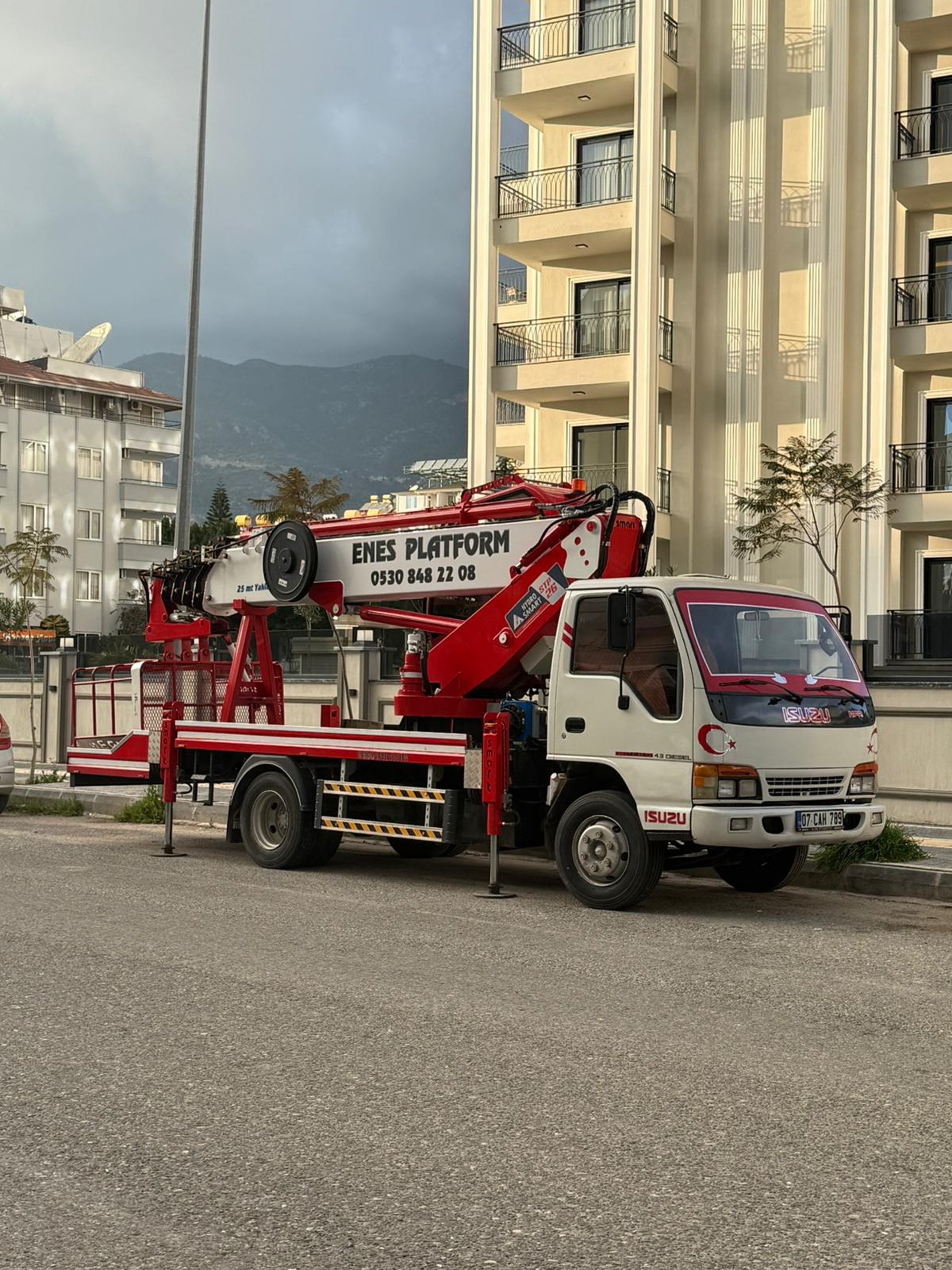 person wearing grey knit sweater