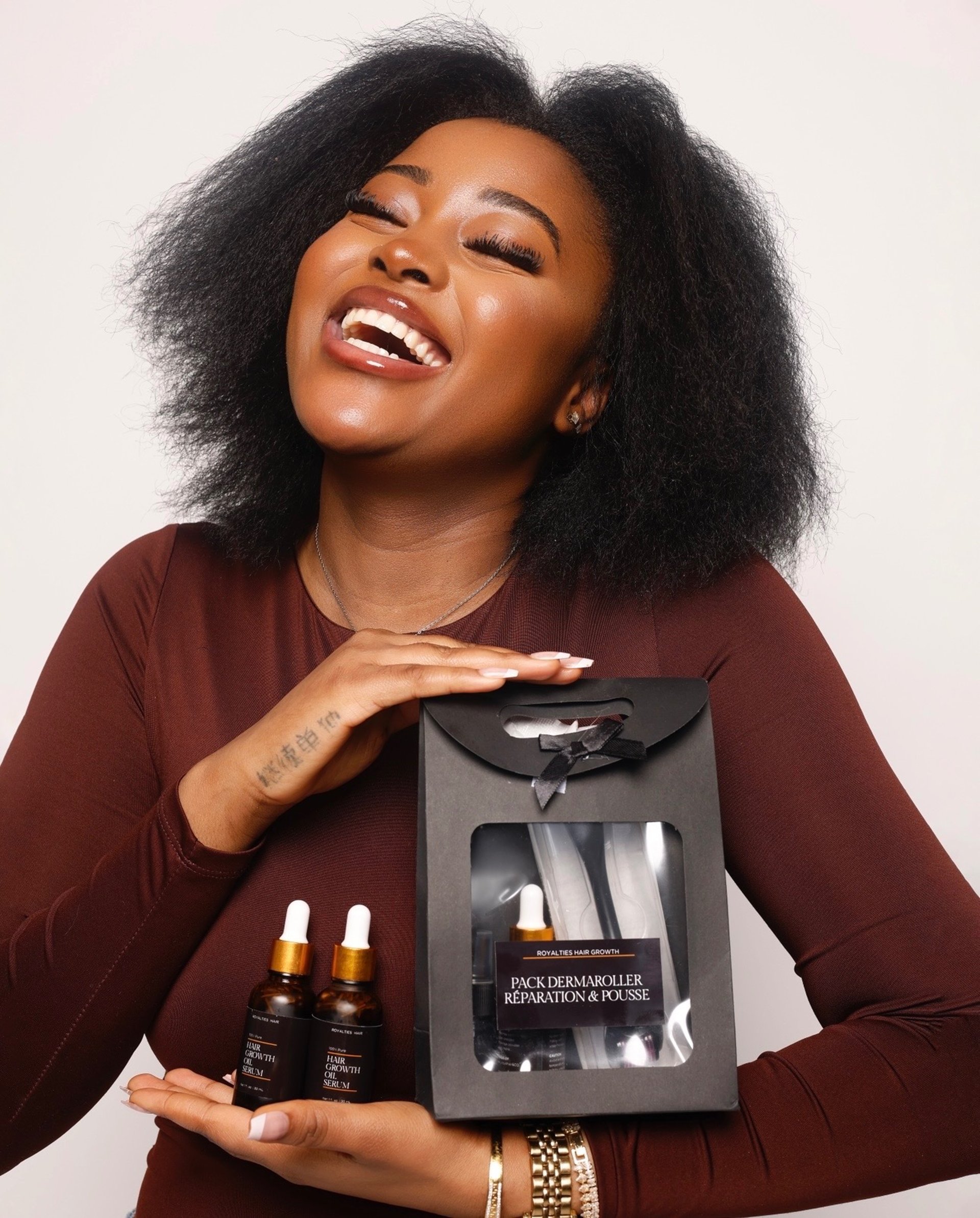 a woman with a brown dress is looking away from the camera