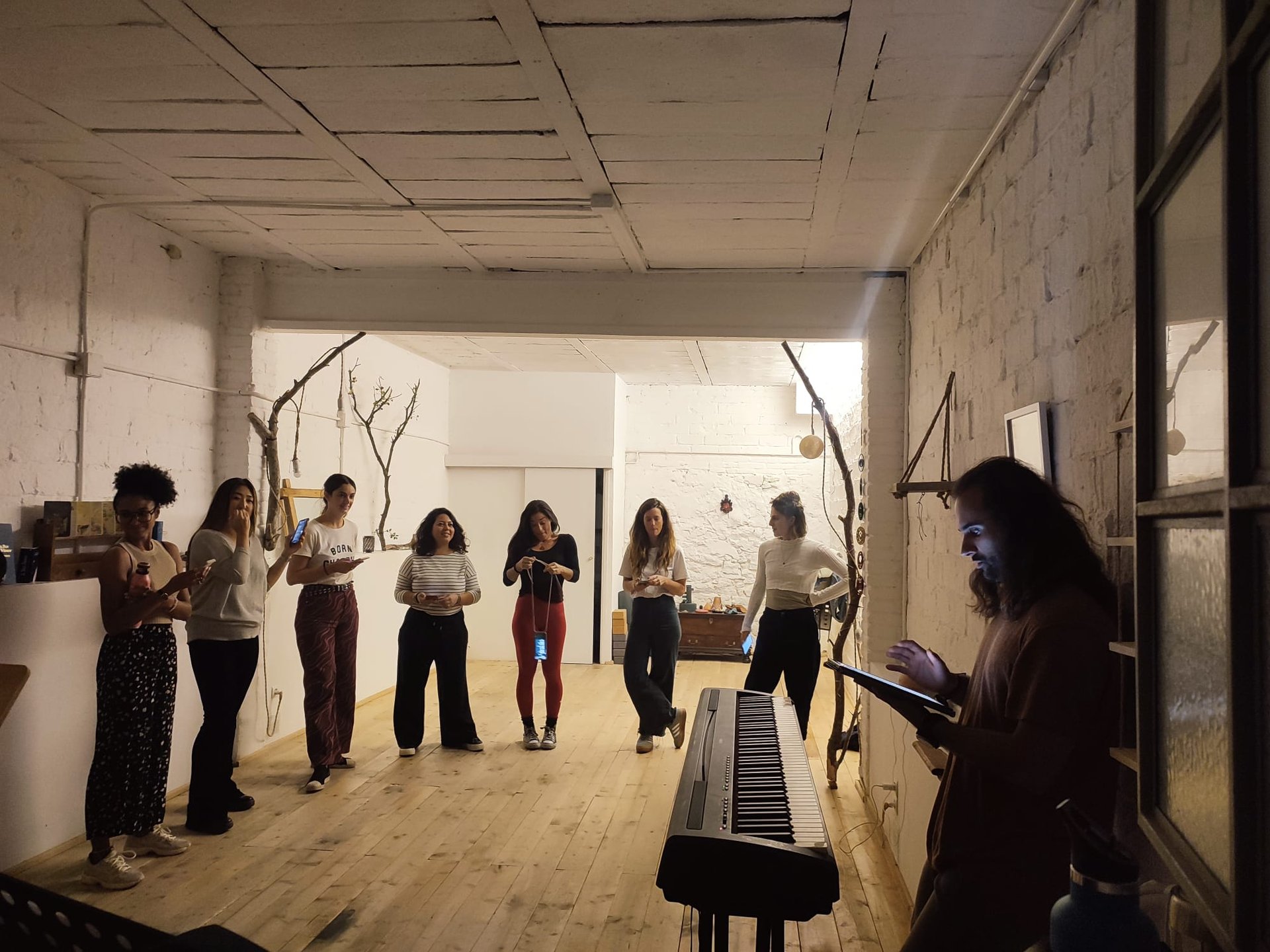 people raising hands during night time