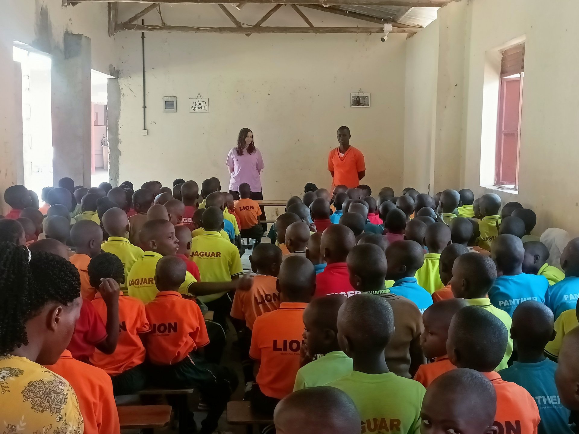 an abstract photo of a curved building with a blue sky in the background