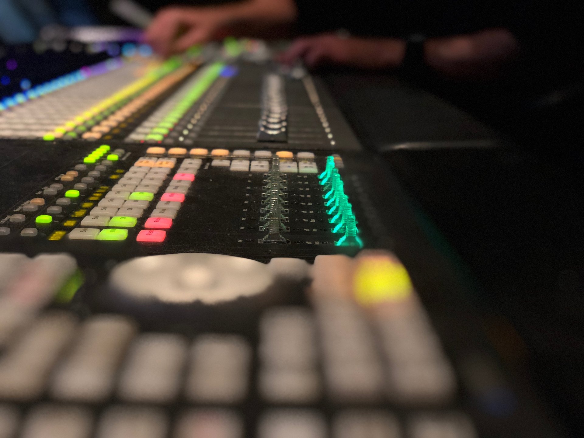 A desk with a keyboard and a monitor