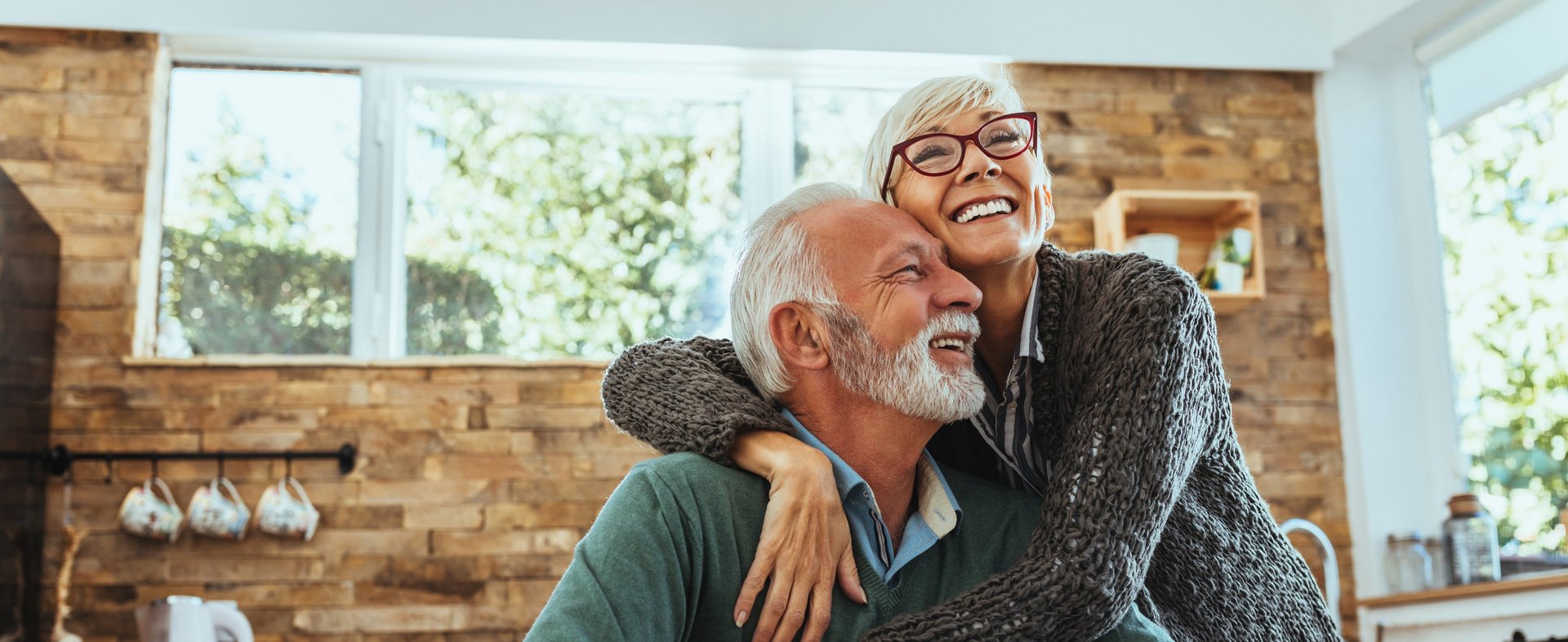woman wearing yellow long-sleeved dress under white clouds and blue sky during daytime