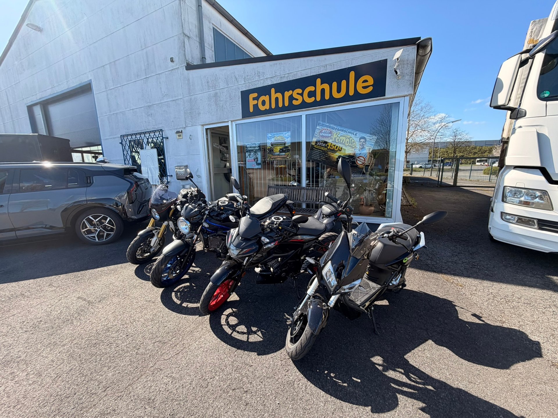 an abstract photo of a curved building with a blue sky in the background