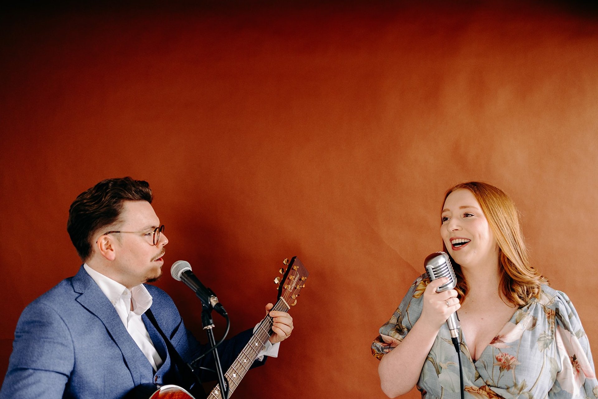 a close up of a black and brown abstract painting
