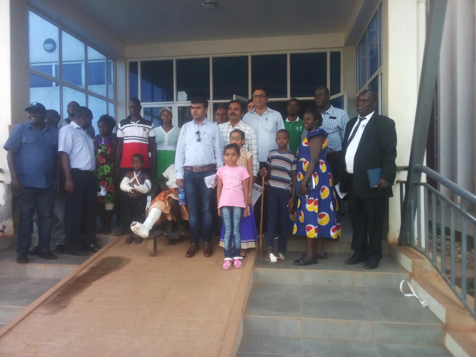 woman wearing yellow long-sleeved dress under white clouds and blue sky during daytime