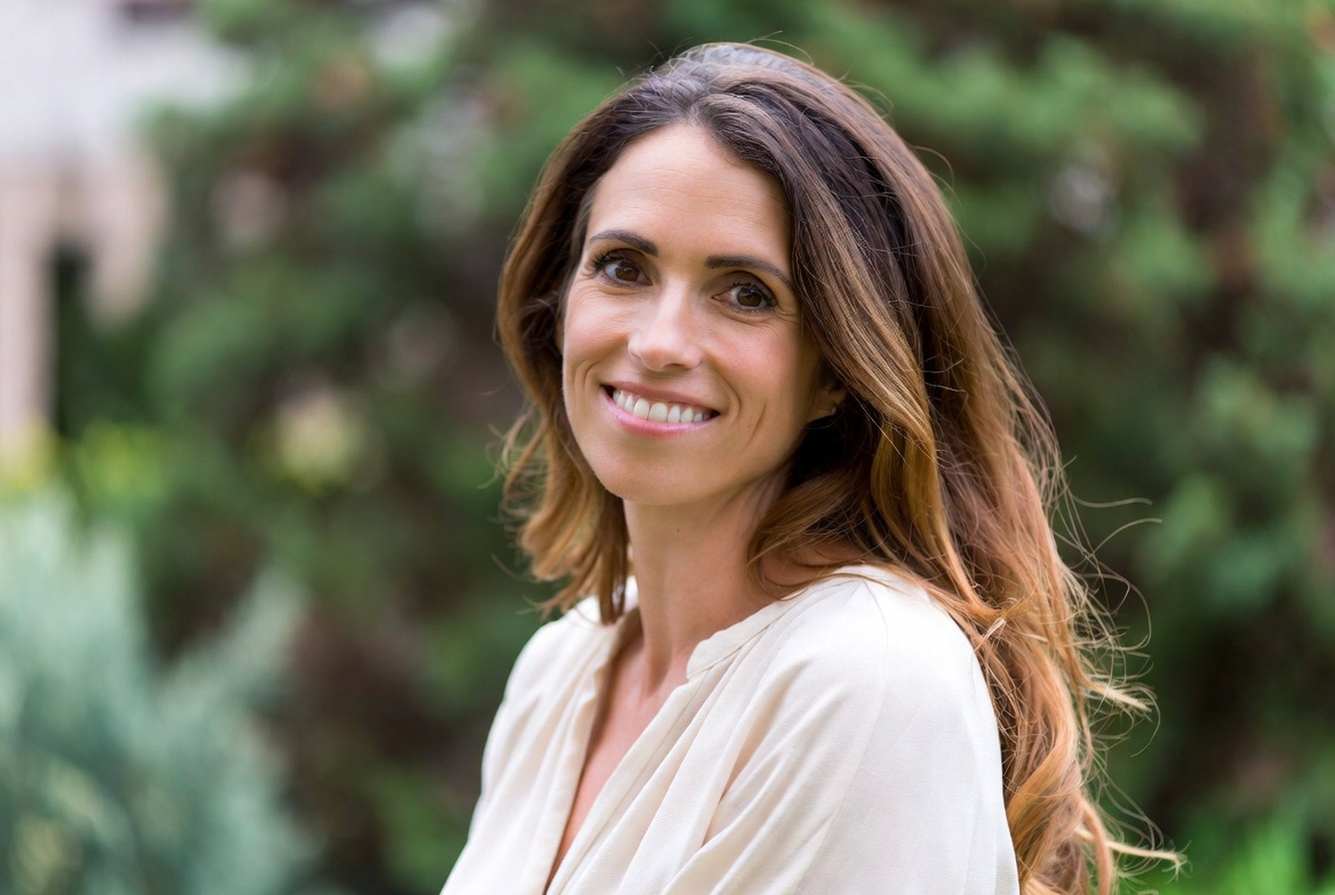 person wearing grey knit sweater