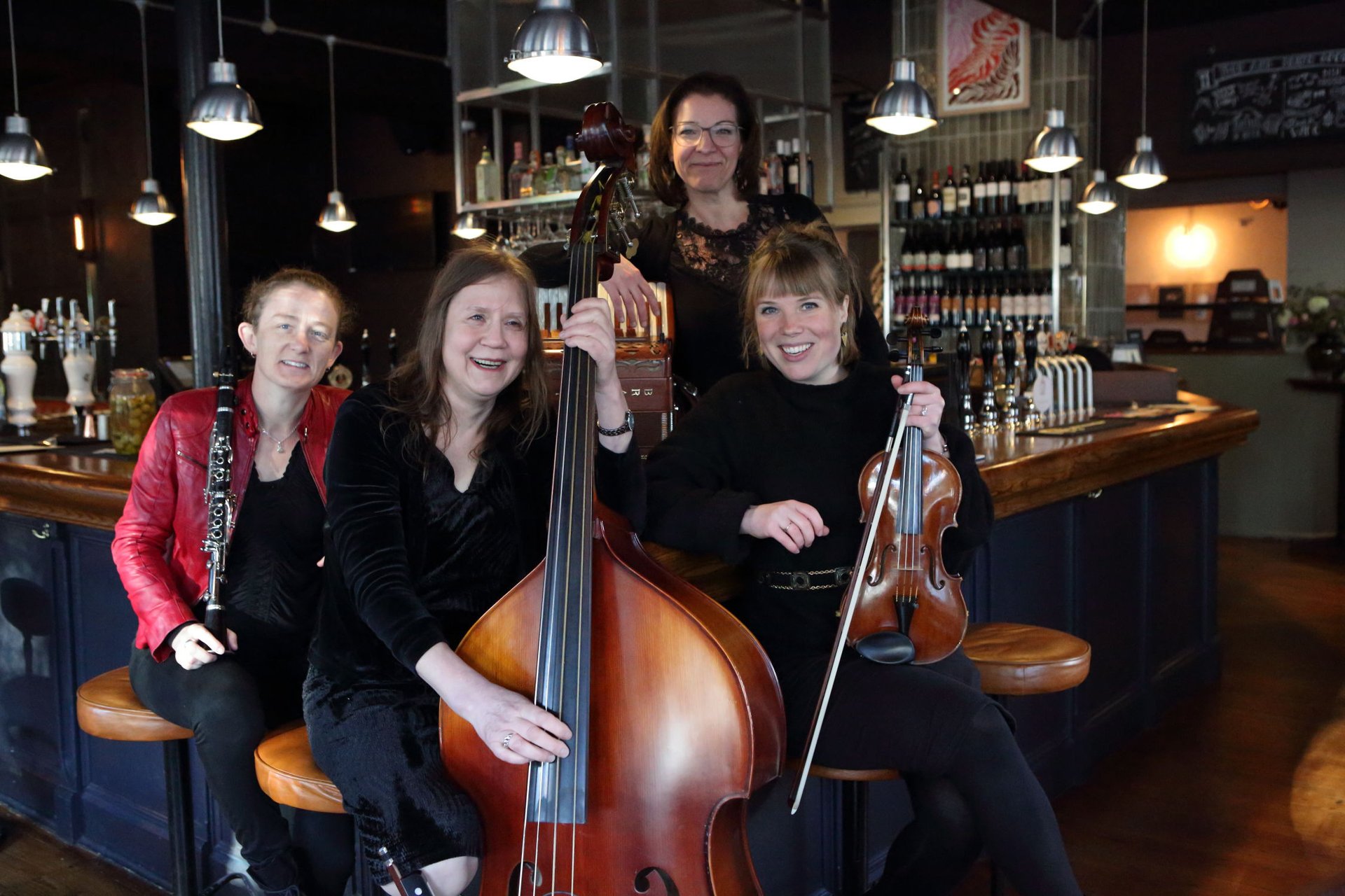 an abstract photo of a curved building with a blue sky in the background