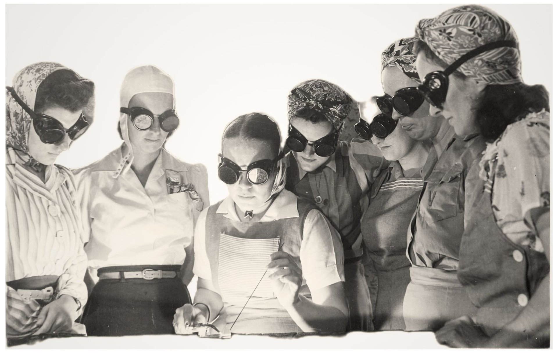 a bunch of different colored sprinkles on a pink background