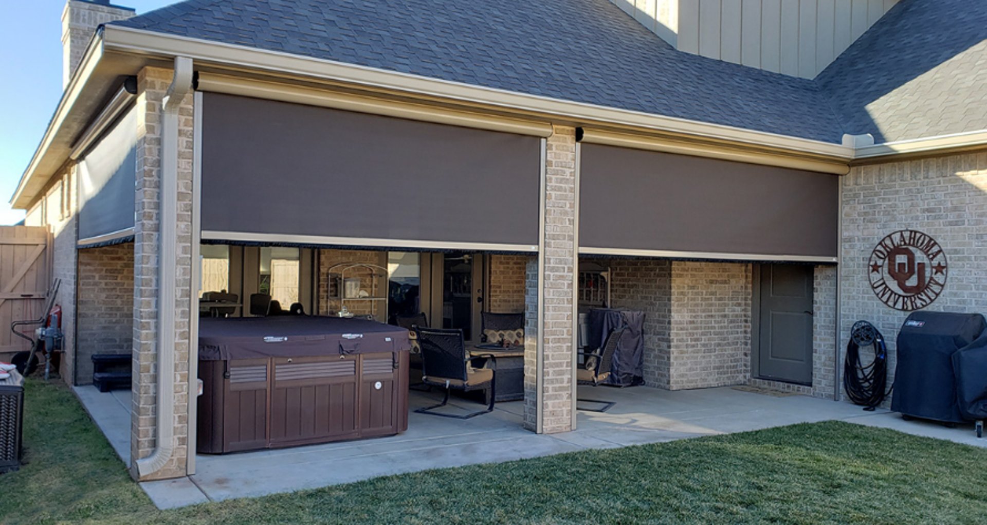 brown wooden fence near green plants during daytime