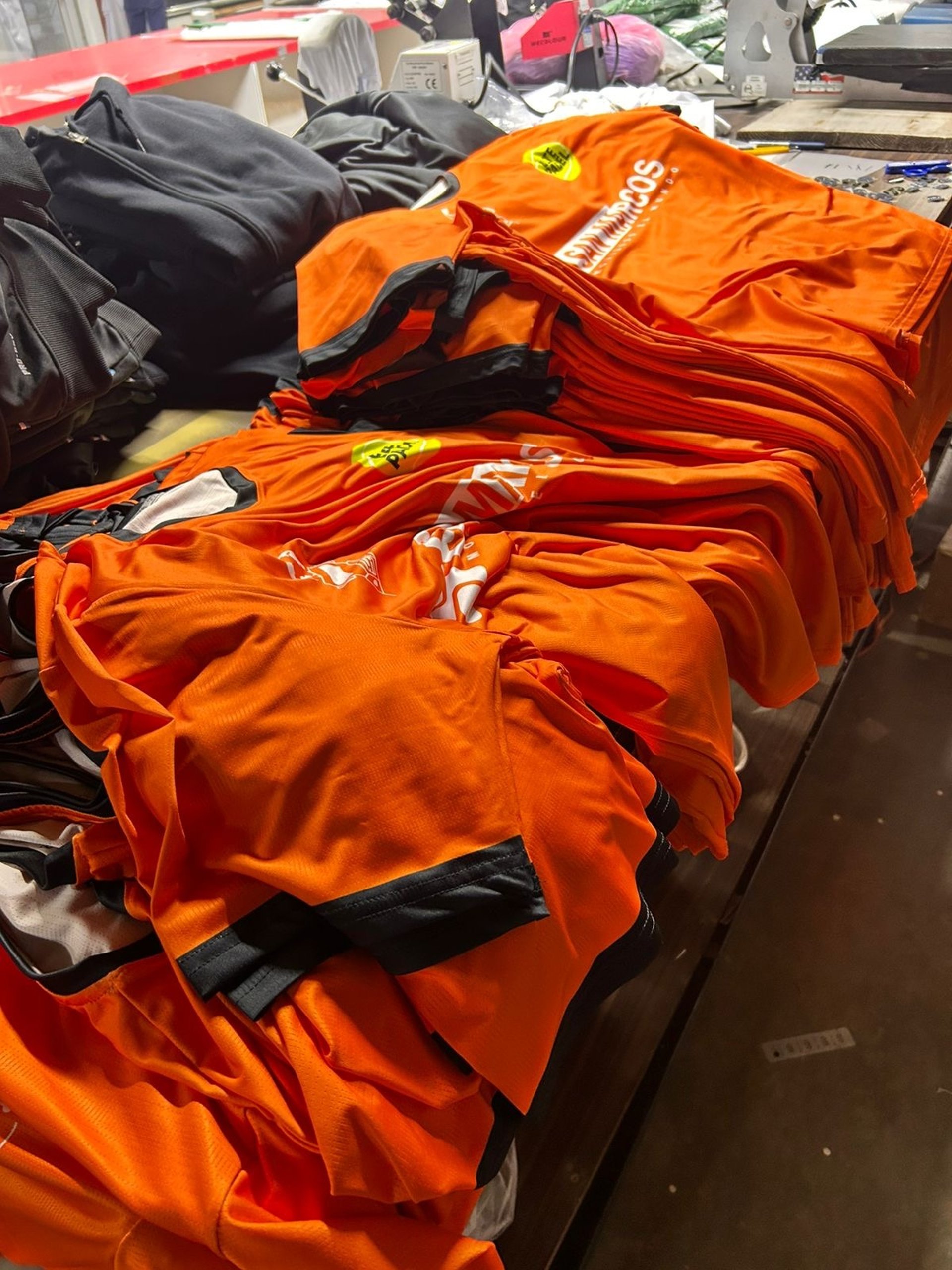 an abstract photo of a curved building with a blue sky in the background