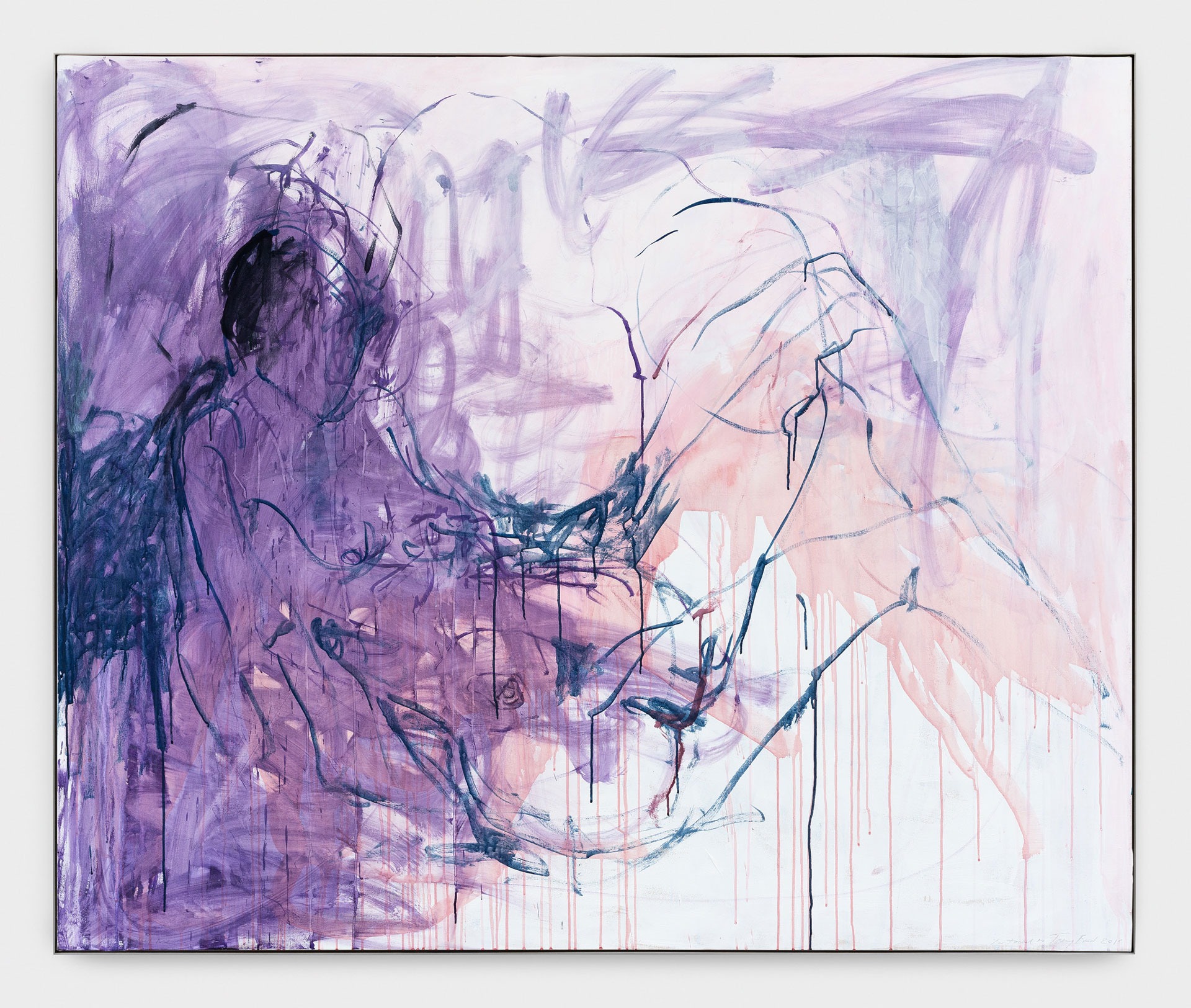 a woman is painting a picture on a easel
