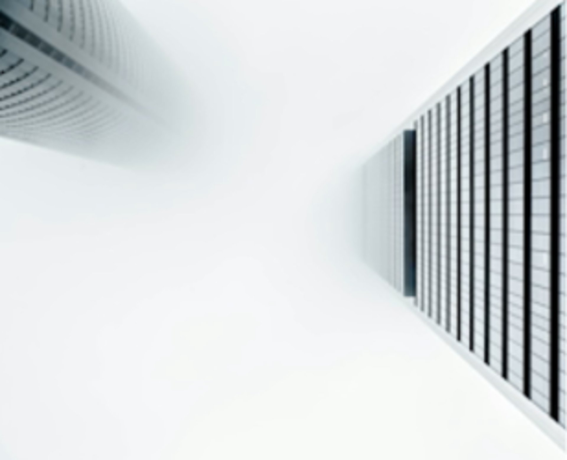 a black keyboard with a blue button on it