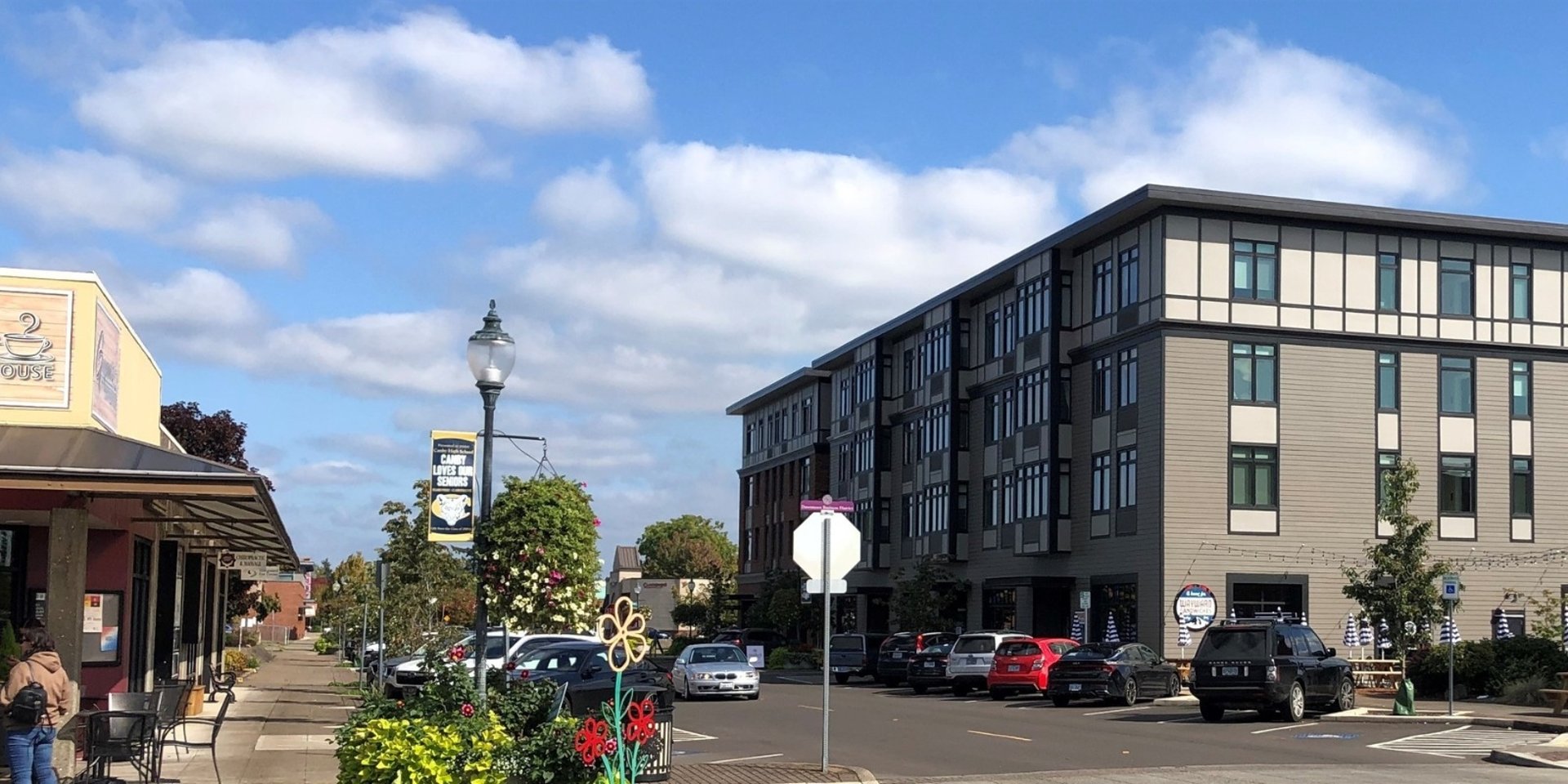 white boats on sea near green trees during daytime