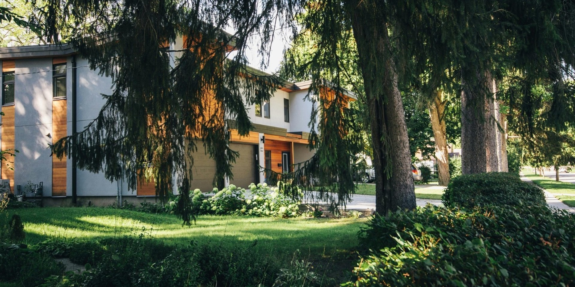 city with high rise buildings near mountain during sunset