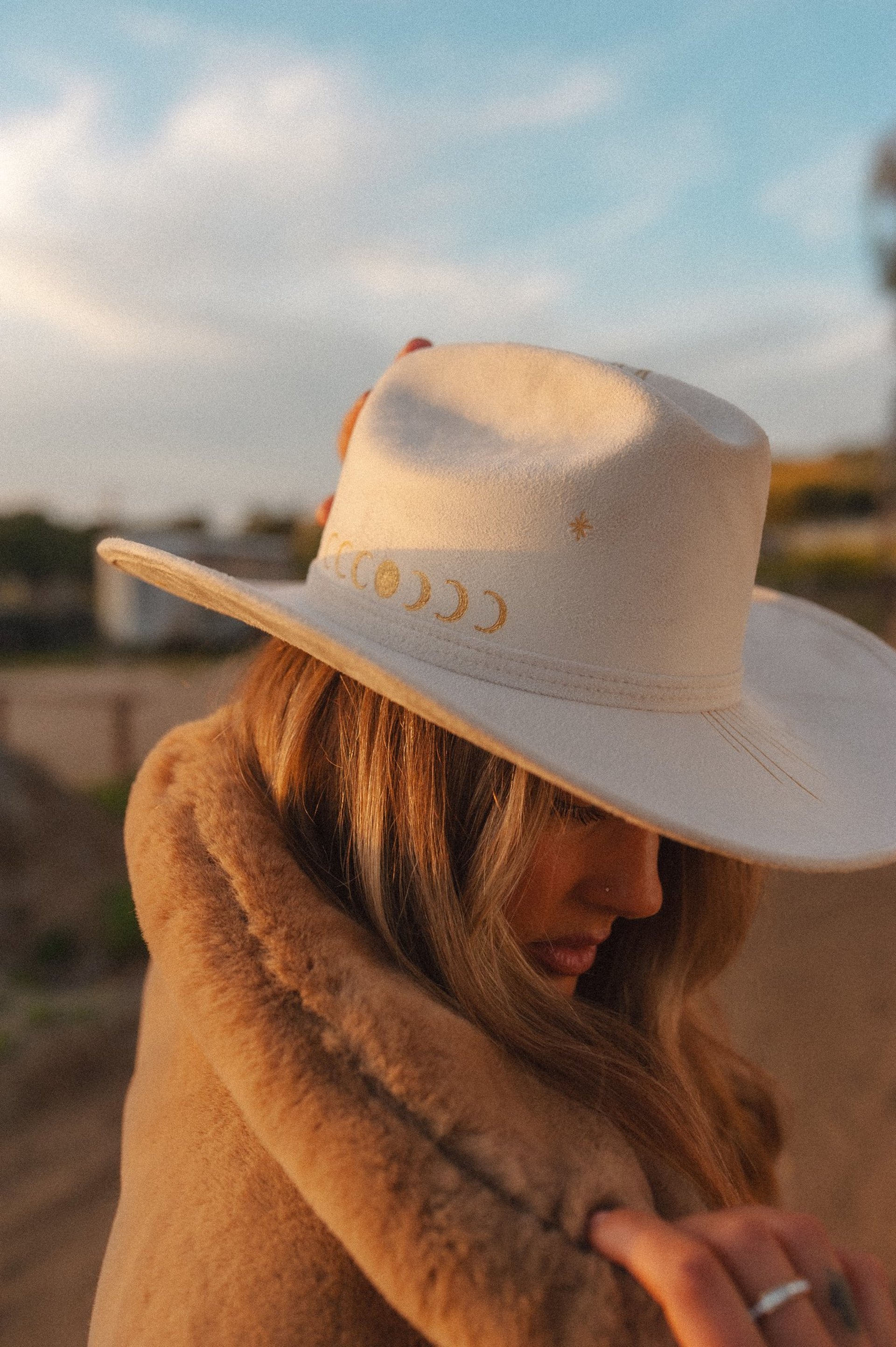 an abstract photo of a curved building with a blue sky in the background