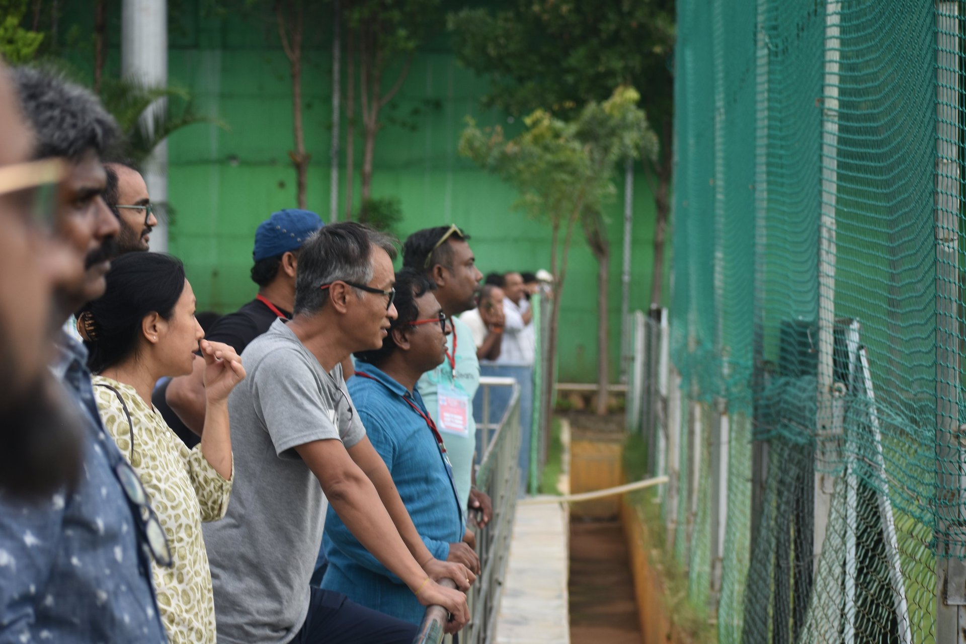 woman wearing yellow long-sleeved dress under white clouds and blue sky during daytime