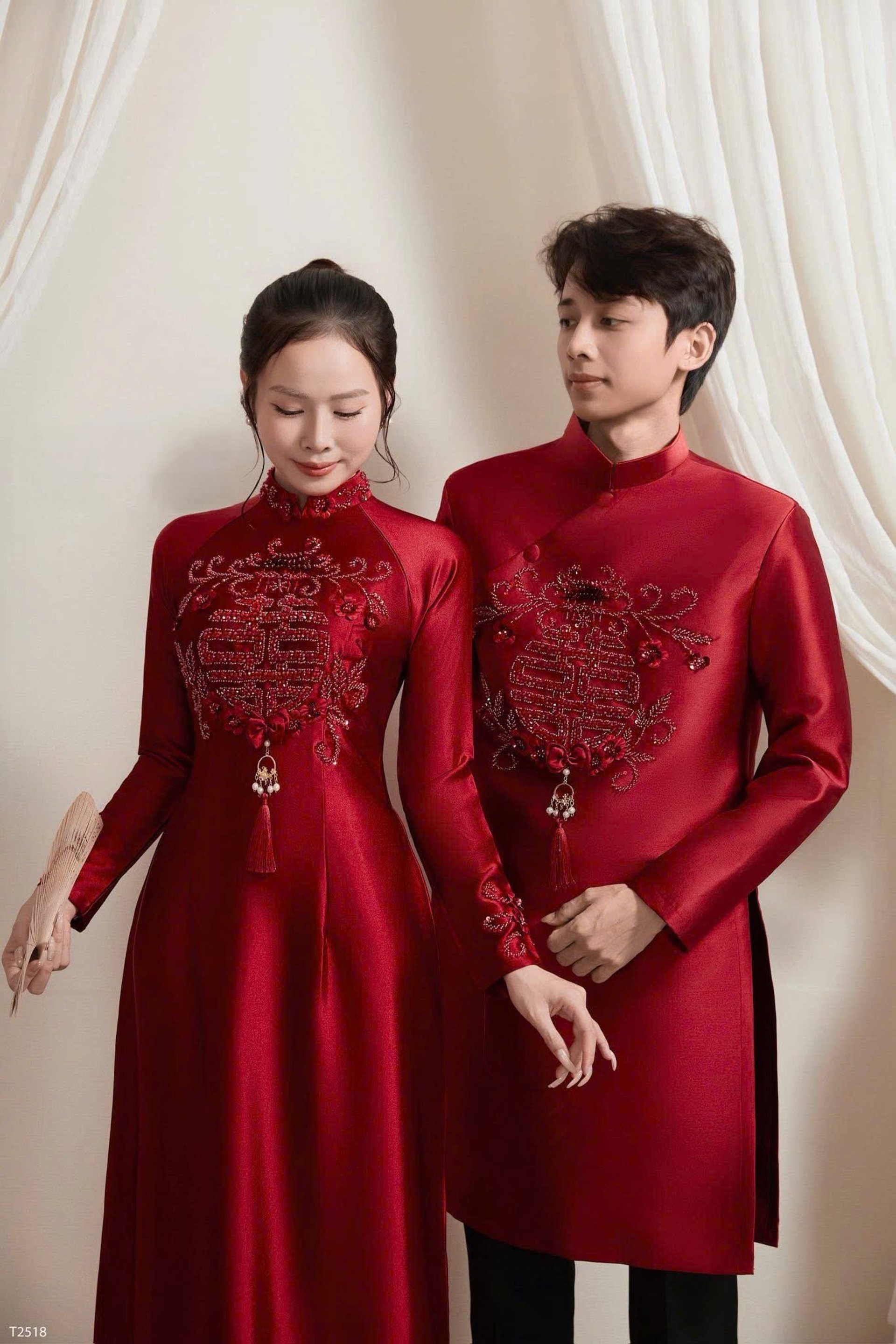 a man in a tuxedo with a flower in his lapel