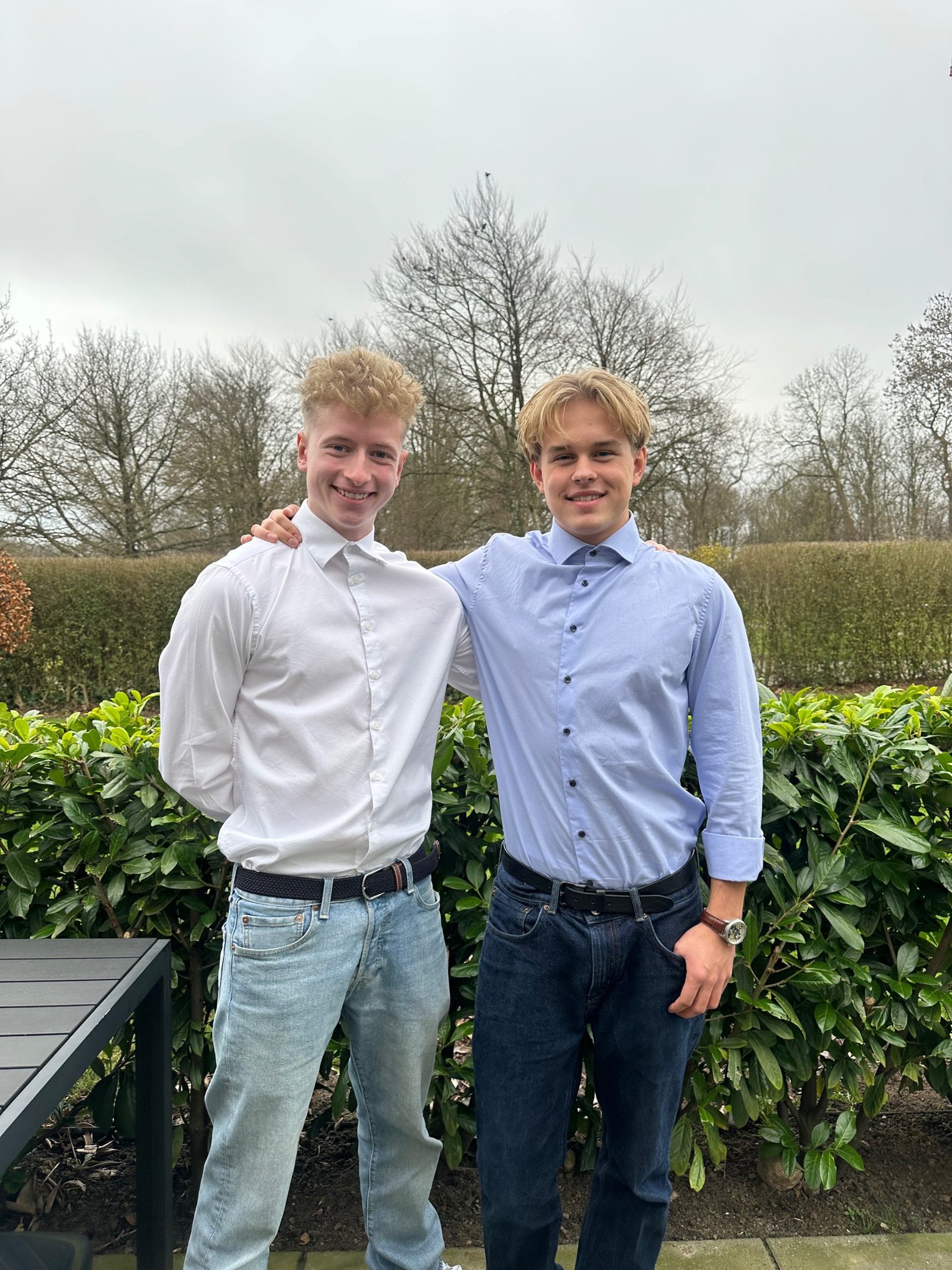 an abstract photo of a curved building with a blue sky in the background