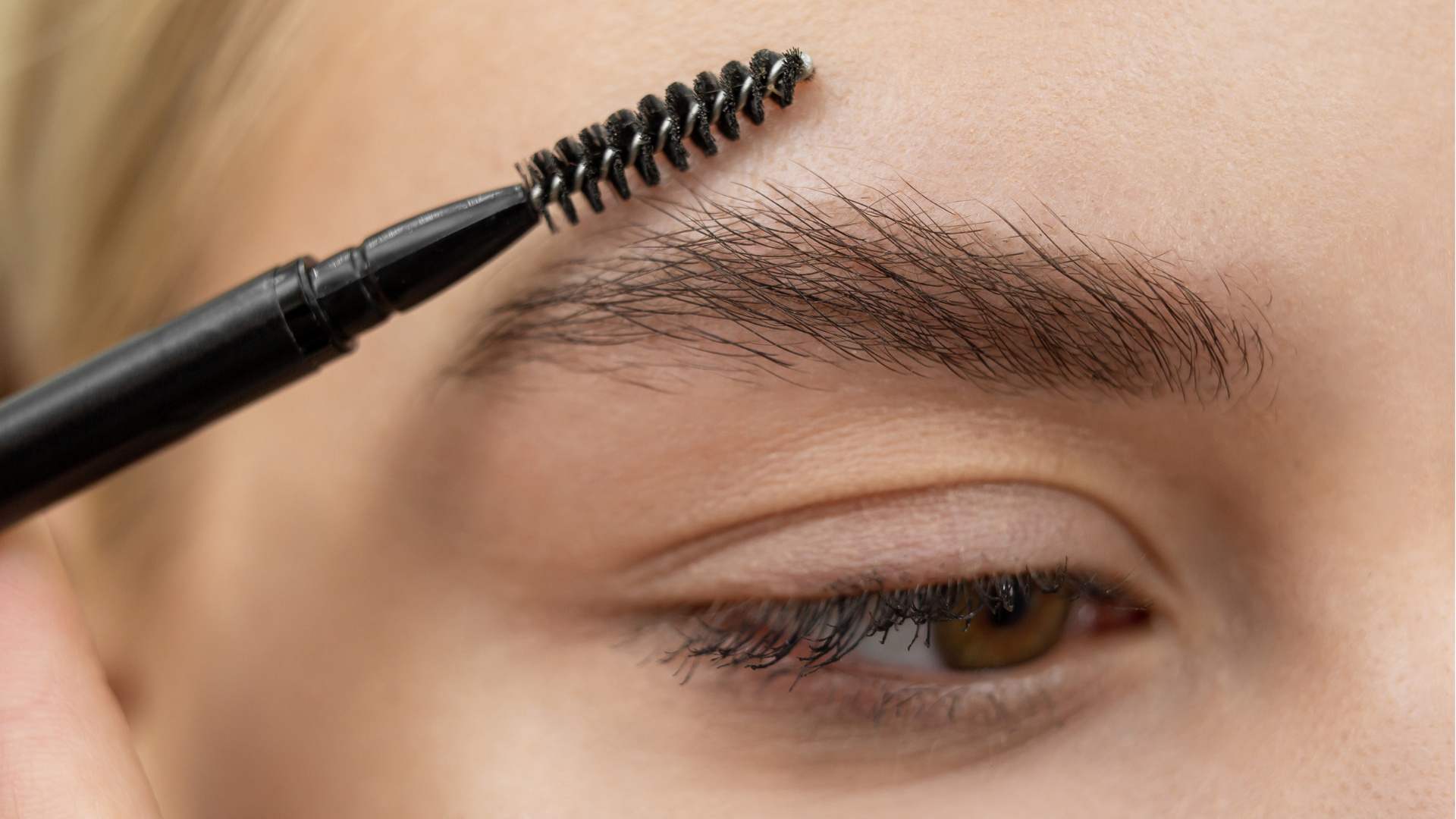 an abstract photo of a curved building with a blue sky in the background