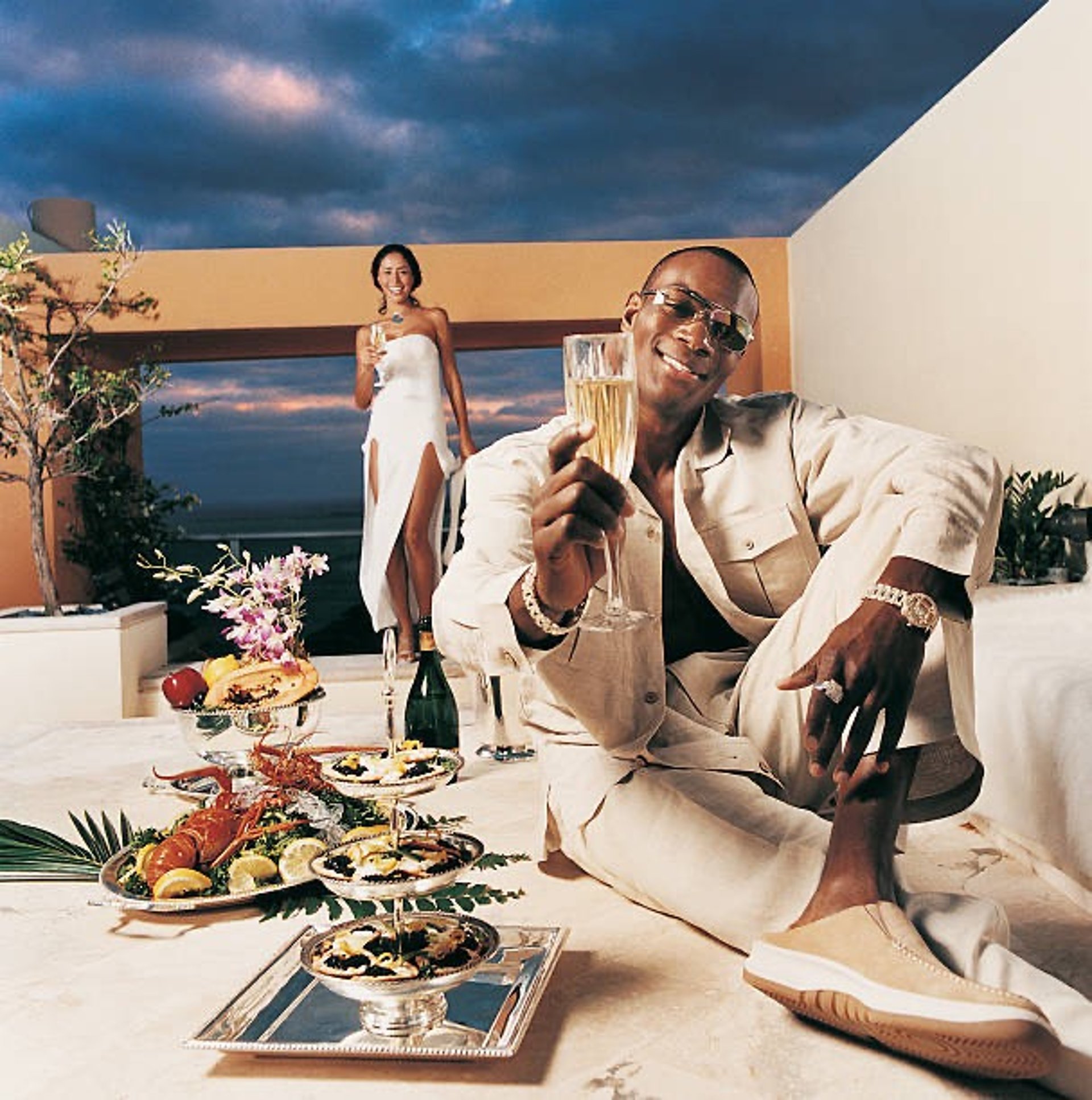 woman wearing yellow long-sleeved dress under white clouds and blue sky during daytime