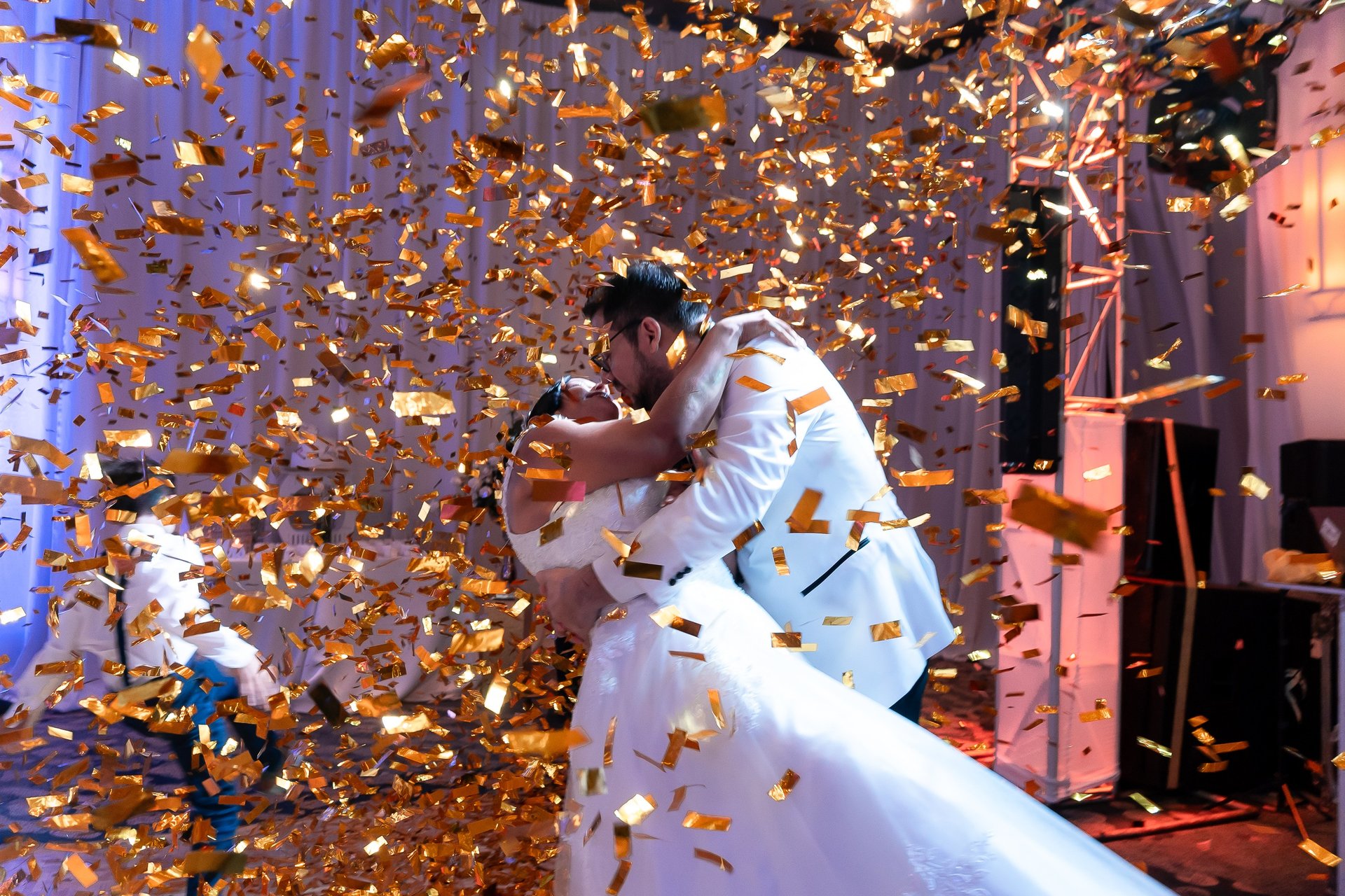 an abstract photo of a curved building with a blue sky in the background