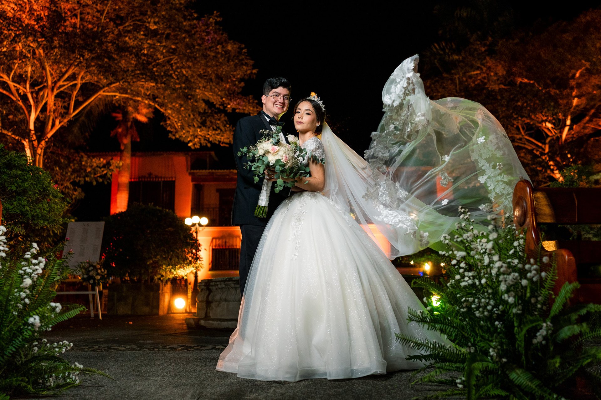 an abstract photo of a curved building with a blue sky in the background