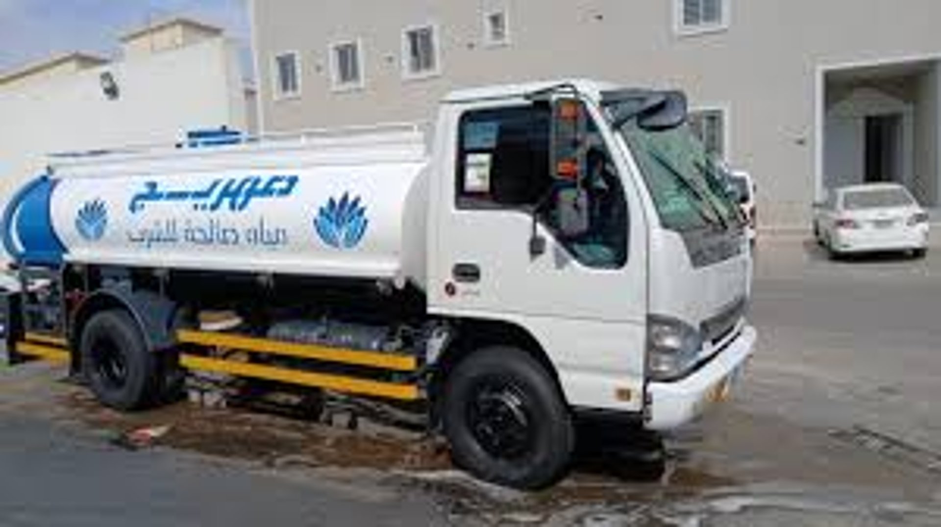 black and brown leather padded tub sofa