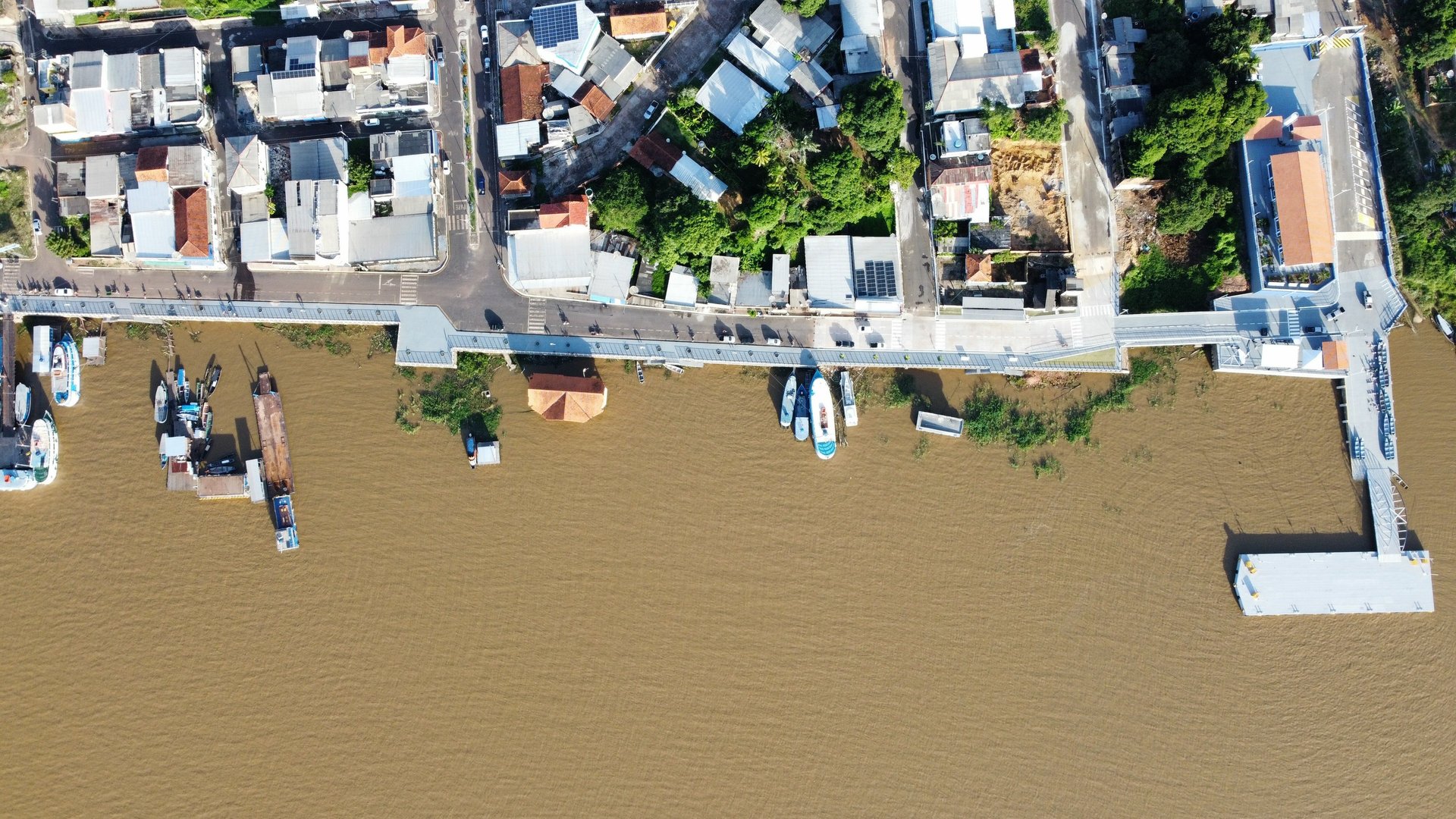 woman wearing yellow long-sleeved dress under white clouds and blue sky during daytime