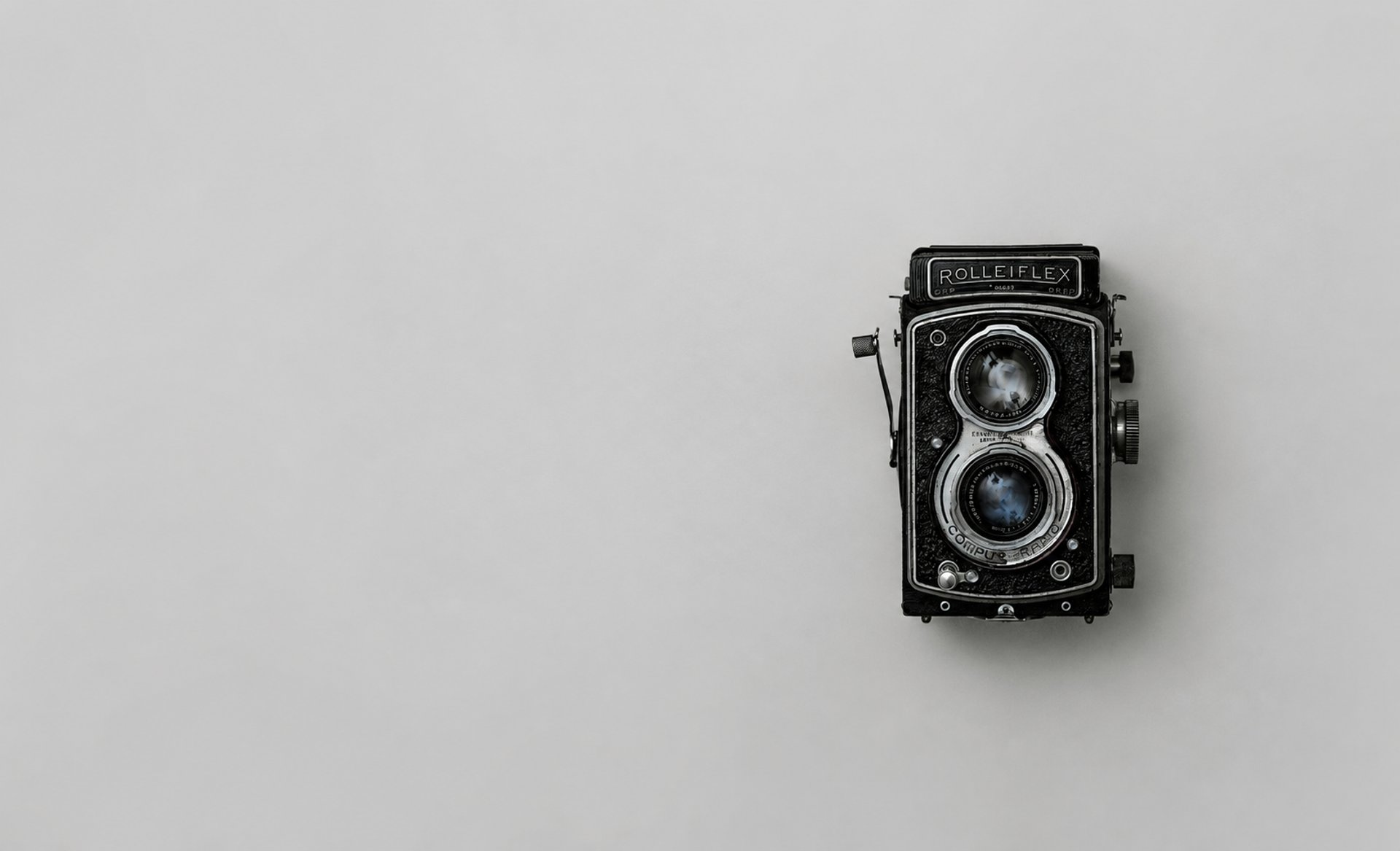 black and silver vintage camera