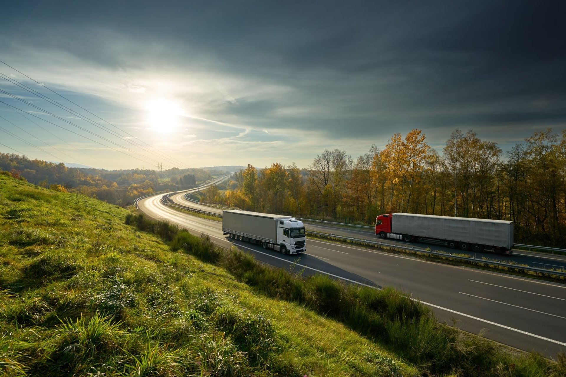 an abstract photo of a curved building with a blue sky in the background