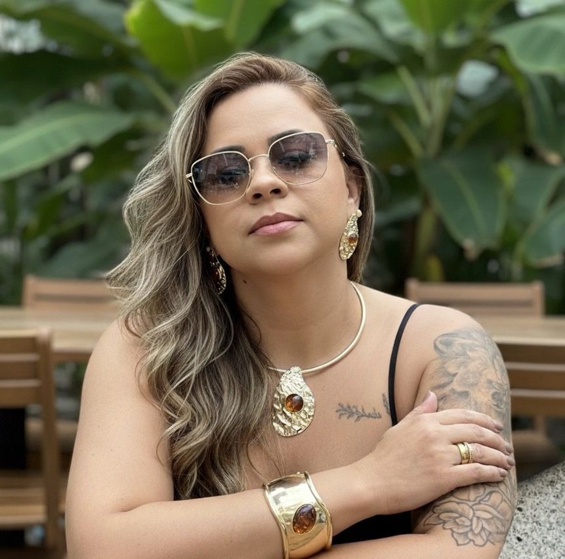 a close up of a black and brown abstract painting