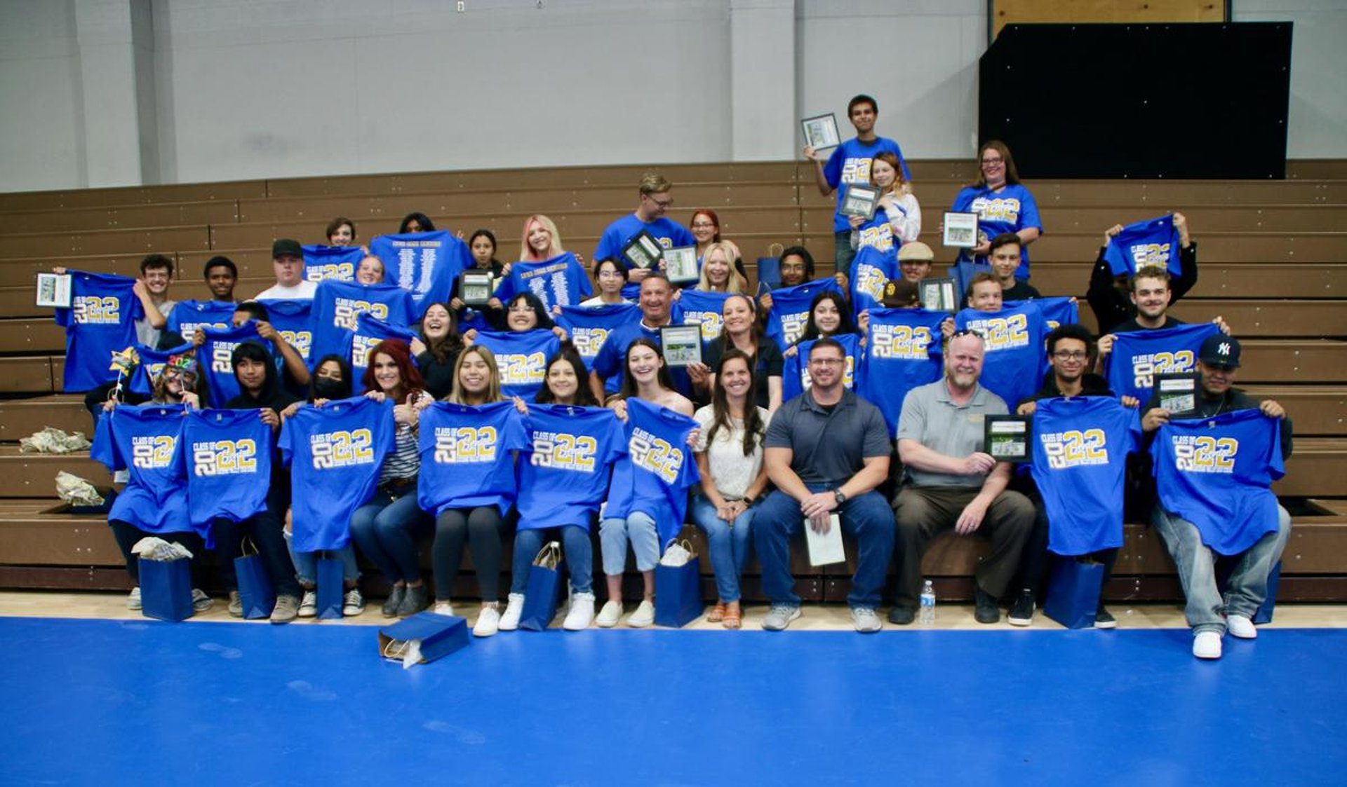 woman wearing yellow long-sleeved dress under white clouds and blue sky during daytime