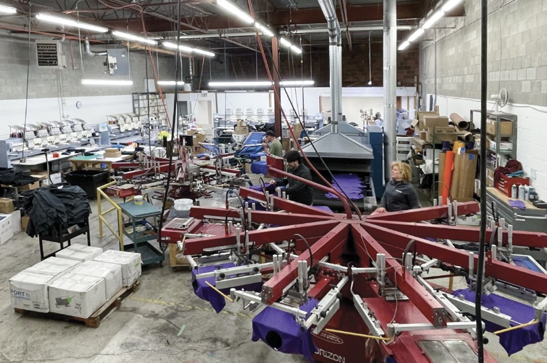 an abstract photo of a curved building with a blue sky in the background